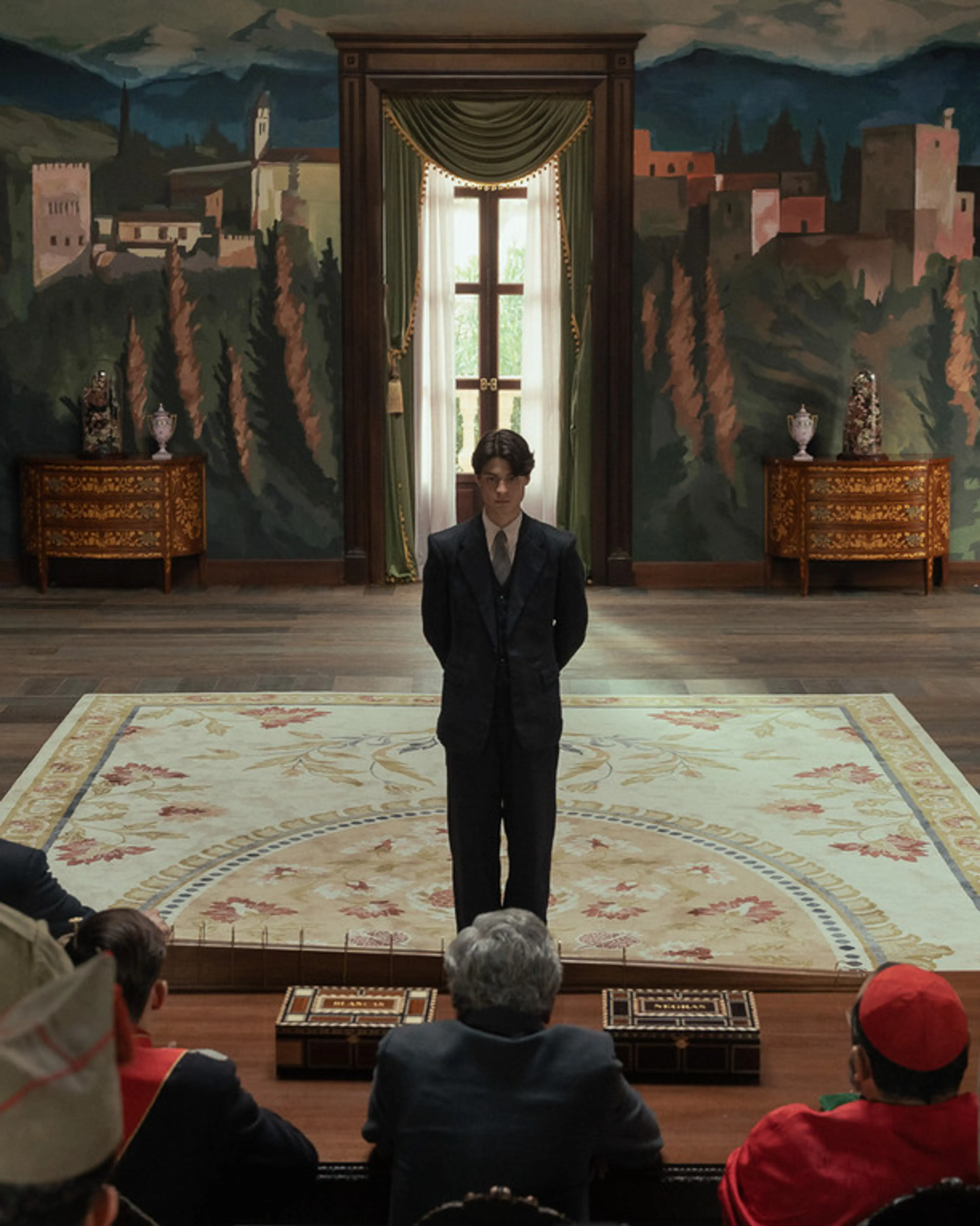 Milo Quifes as Carlos in La Bola Negra.