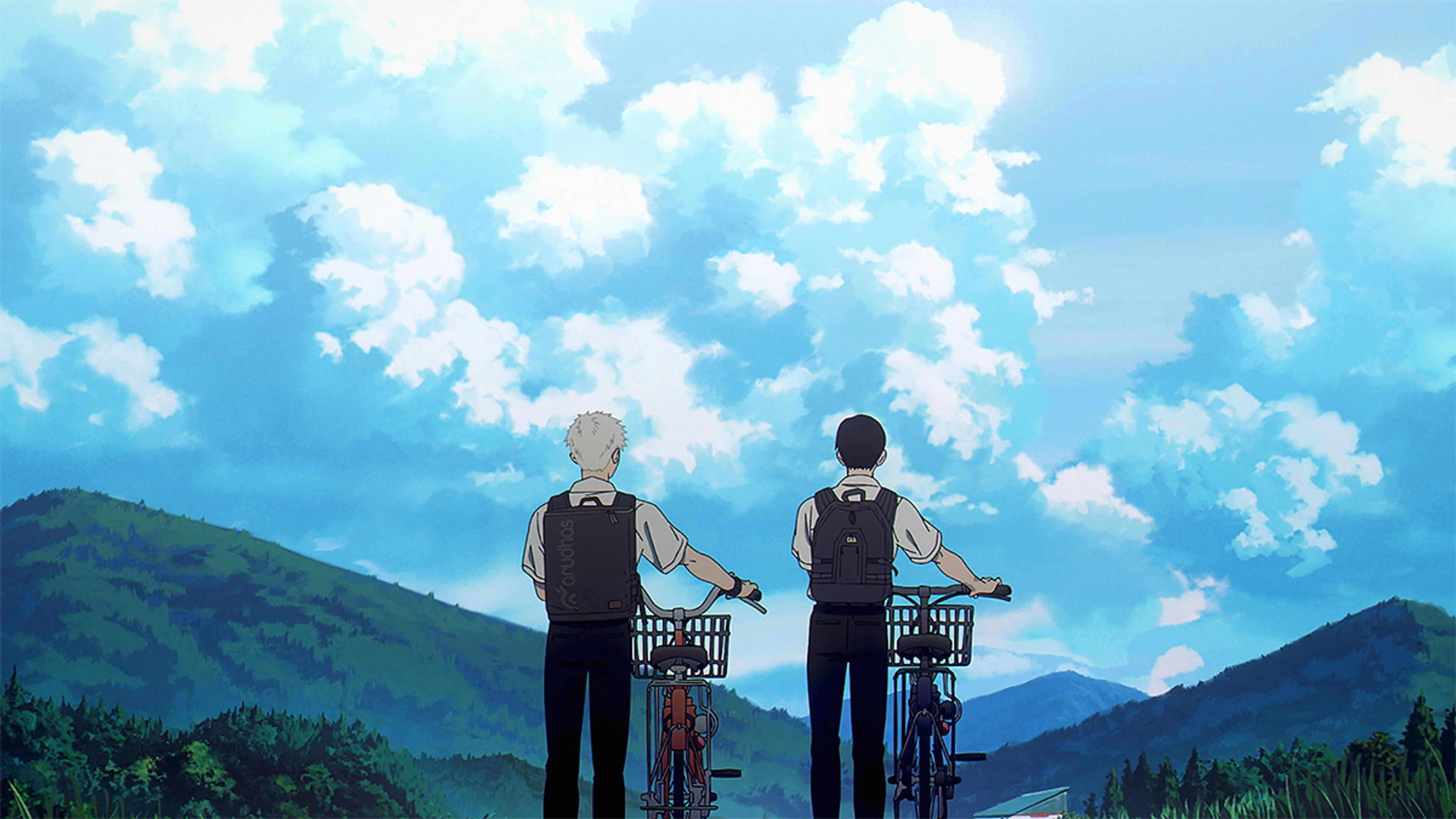 Hikaru and Yoshiki stand with their bikes beneath a huge summer sky.