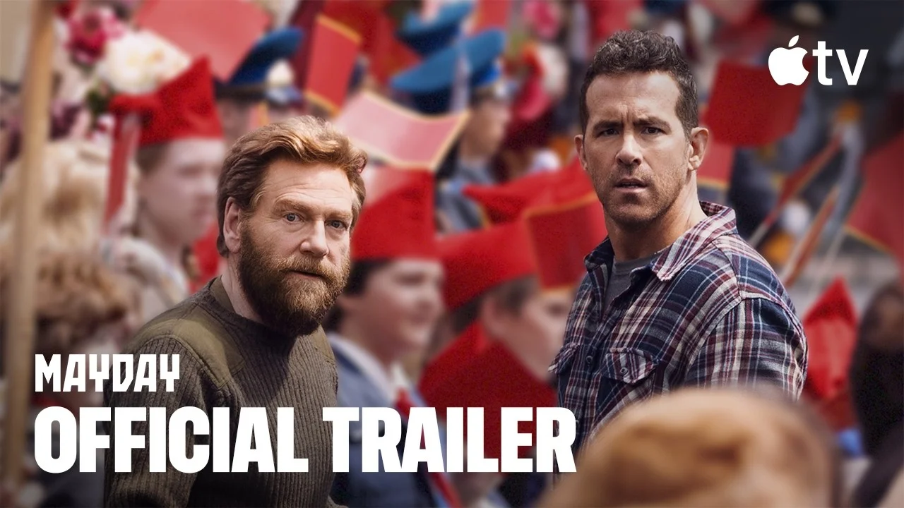 Ryan Reynolds and Kenneth Branagh face the camera in an official Mayday trailer still.