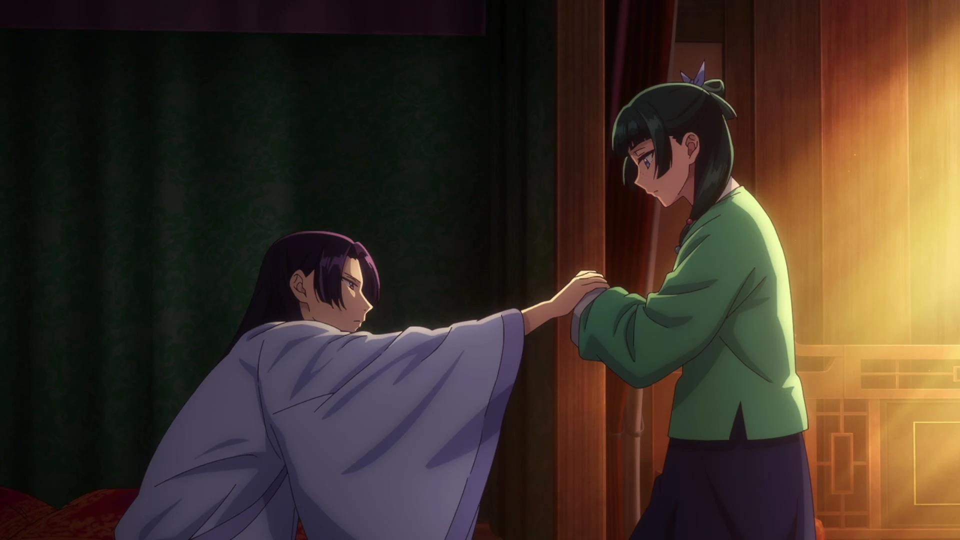 Jinshi reaches toward Maomao in a scene from The Apothecary Diaries Season 3 trailer.