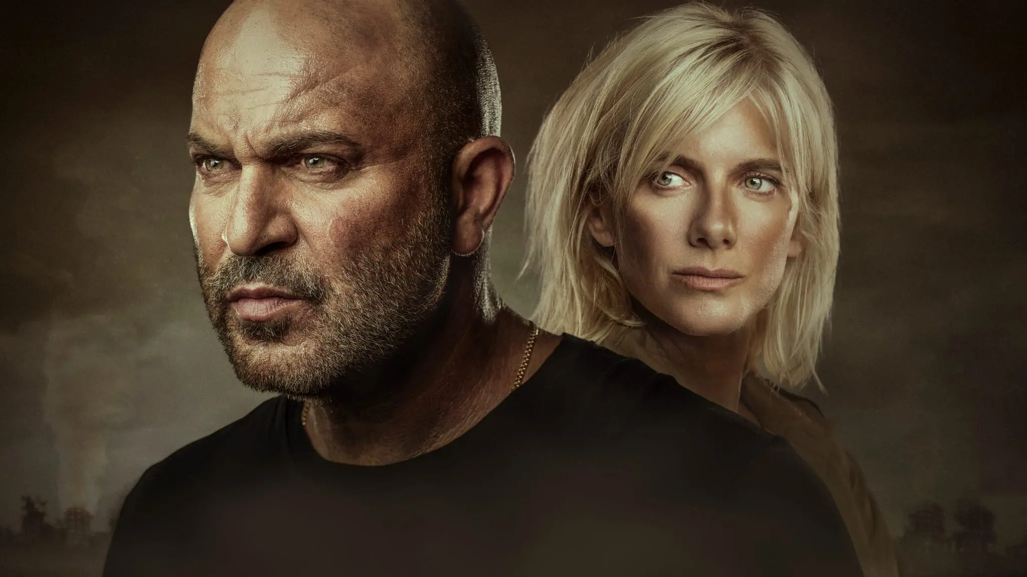 Doron stands in front of Anne in a clean Fauda Season 5 character image.