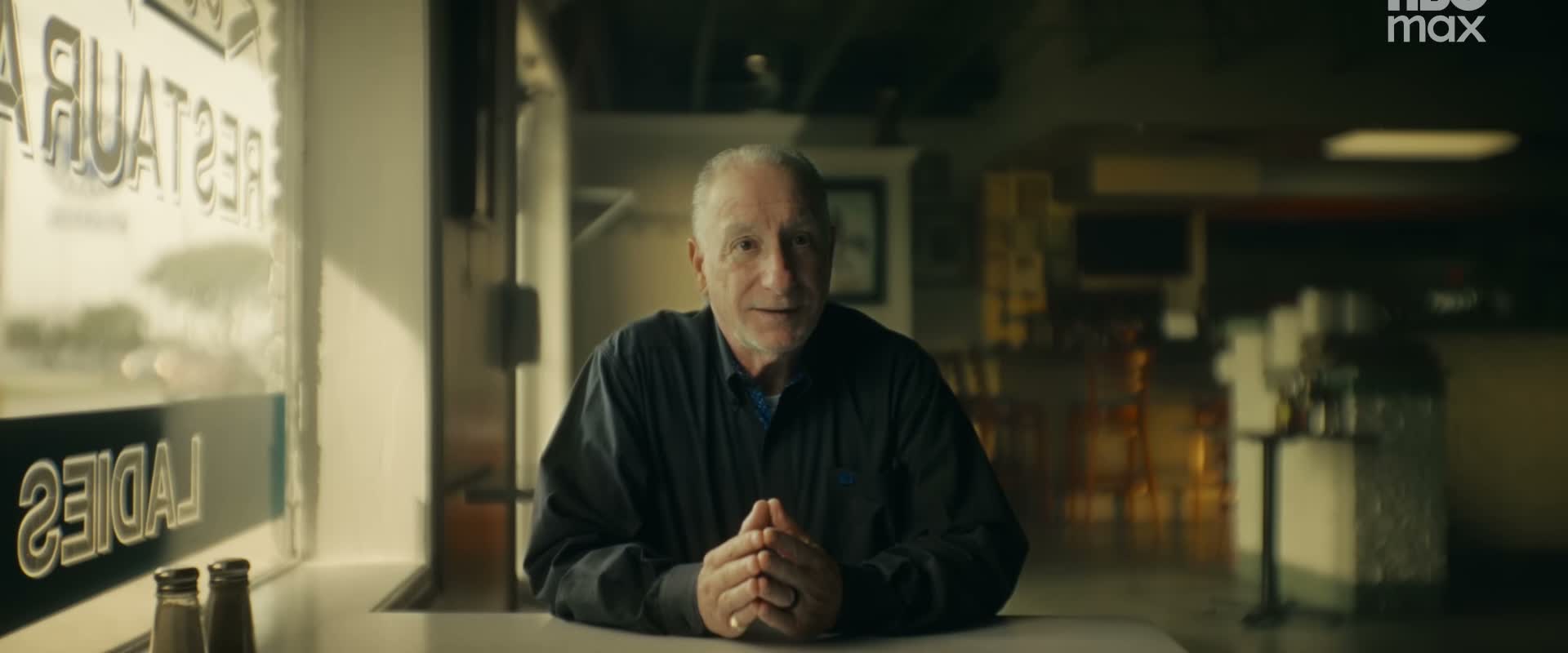 A man sits for an interview in The Pet Cemetery Murders: A Ghost Story.