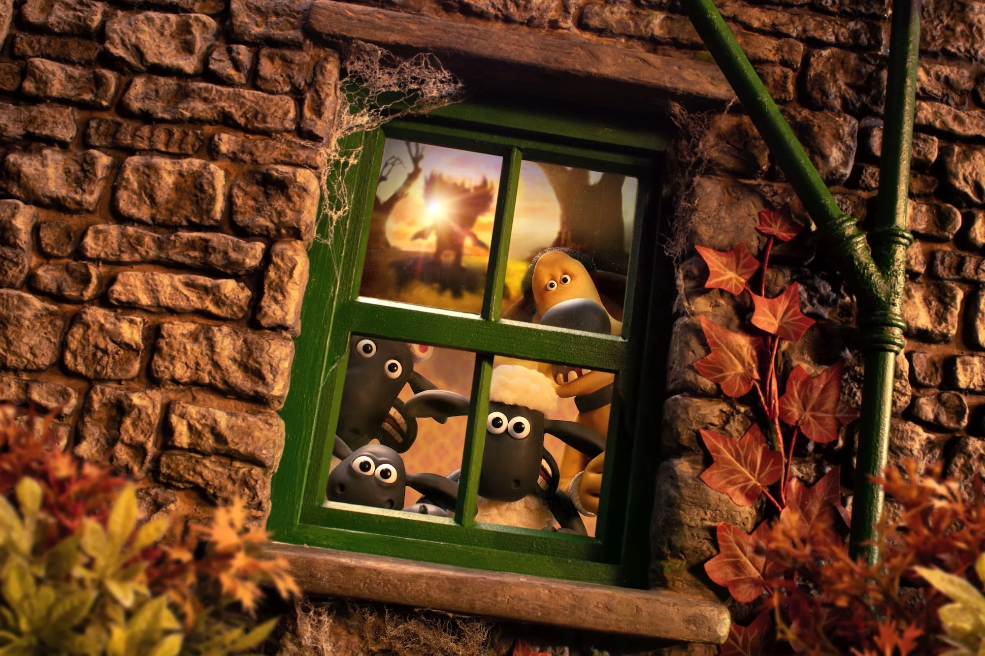 Shaun, Bitzer and their friends peer through a farmhouse window at dusk.