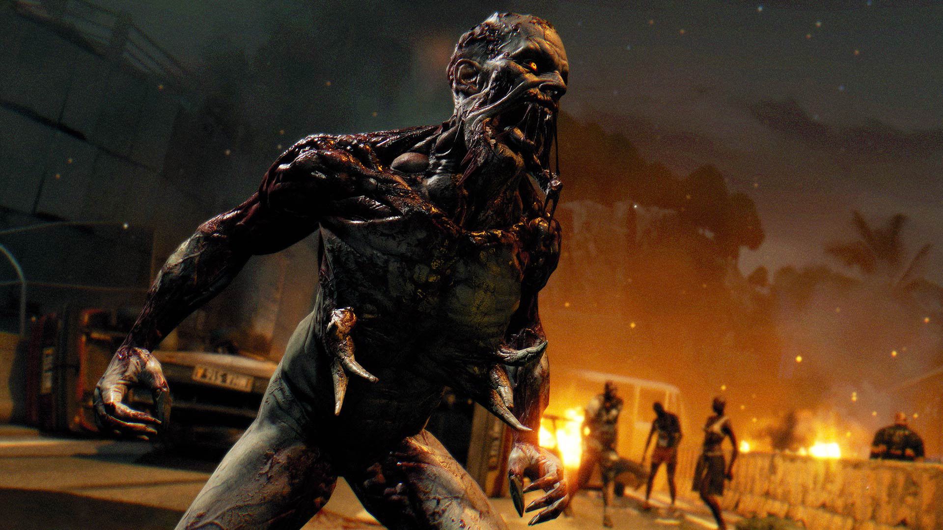 A dangerous infected creature appears in a dark street at night, with orange light behind it.