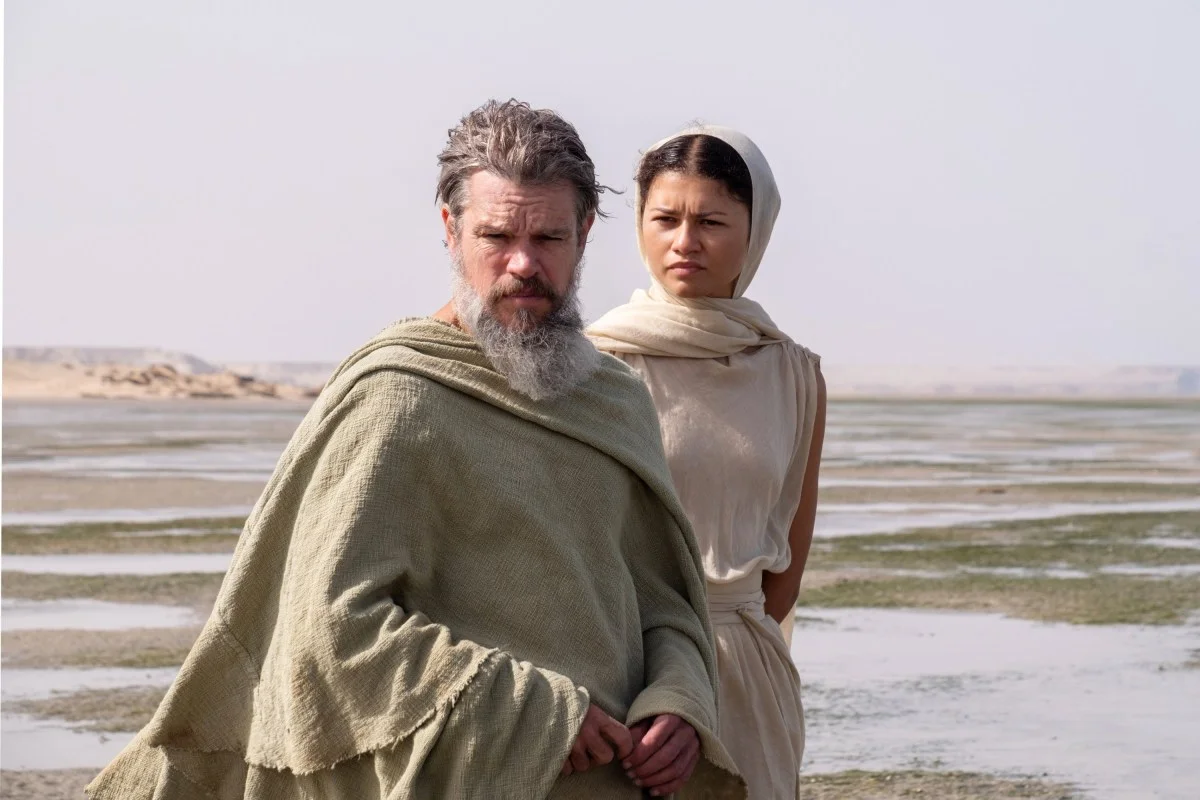 Matt Damon as Odysseus stands beside Zendaya in The Odyssey.