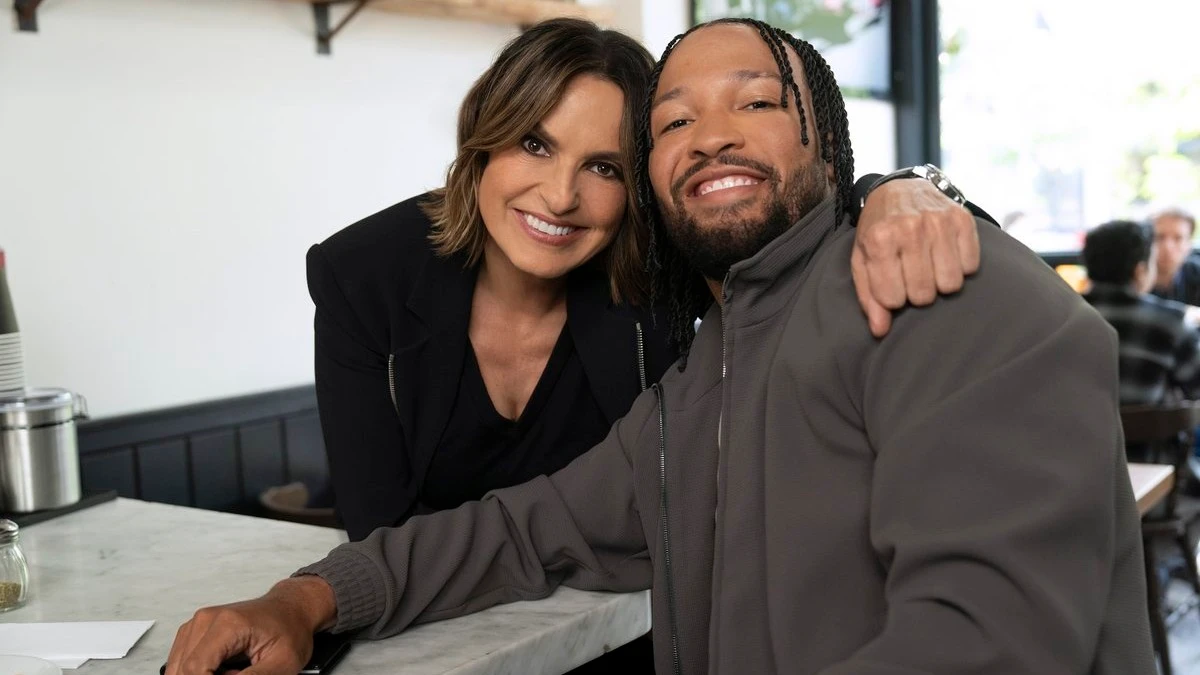 Mariska Hargitay smiles beside Jalen Brunson on the Law & Order: SVU set.