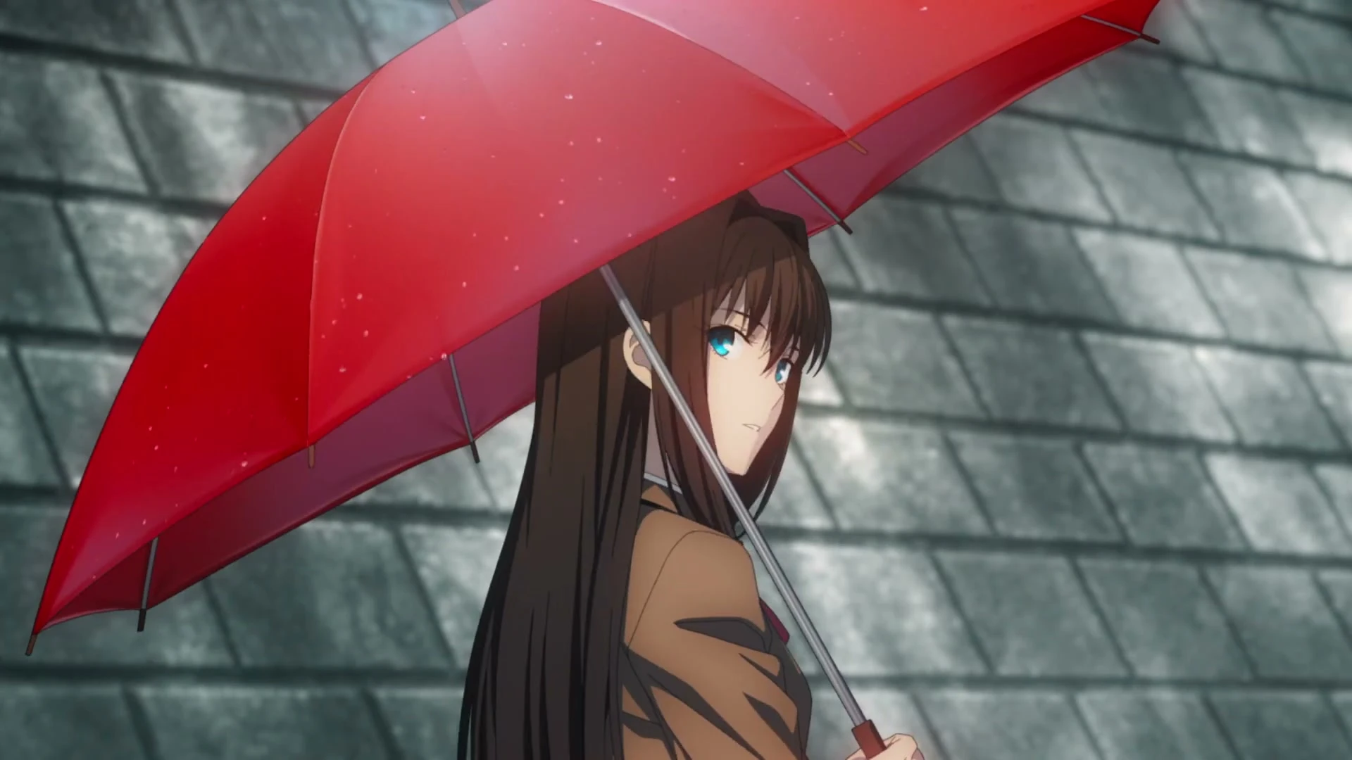 Aoko Aozaki walks beneath a red umbrella in an official Witch on the Holy Night trailer frame.