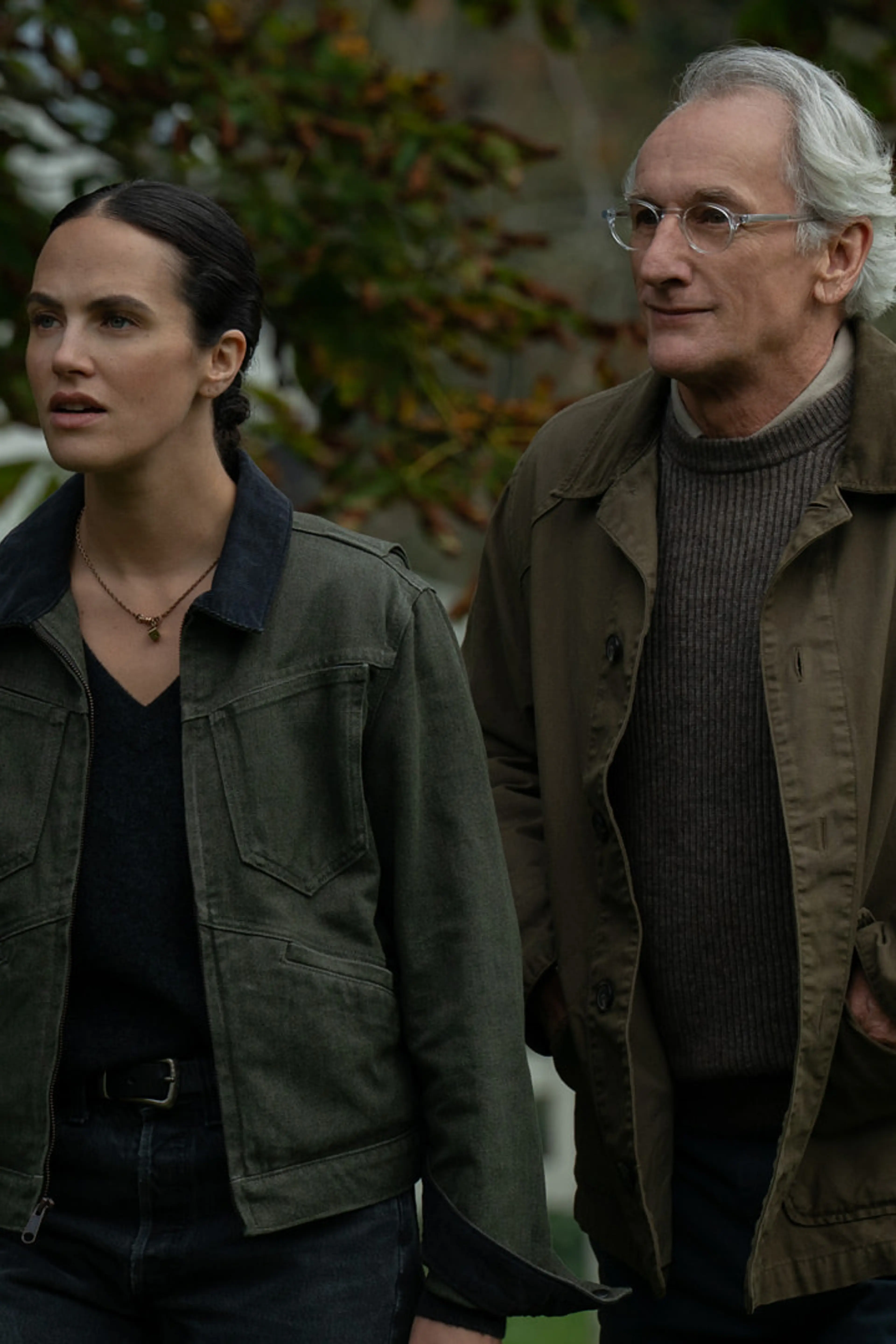 Rebecca Ferguson and Tim Robbins appear in an official Silo Season 3 still.