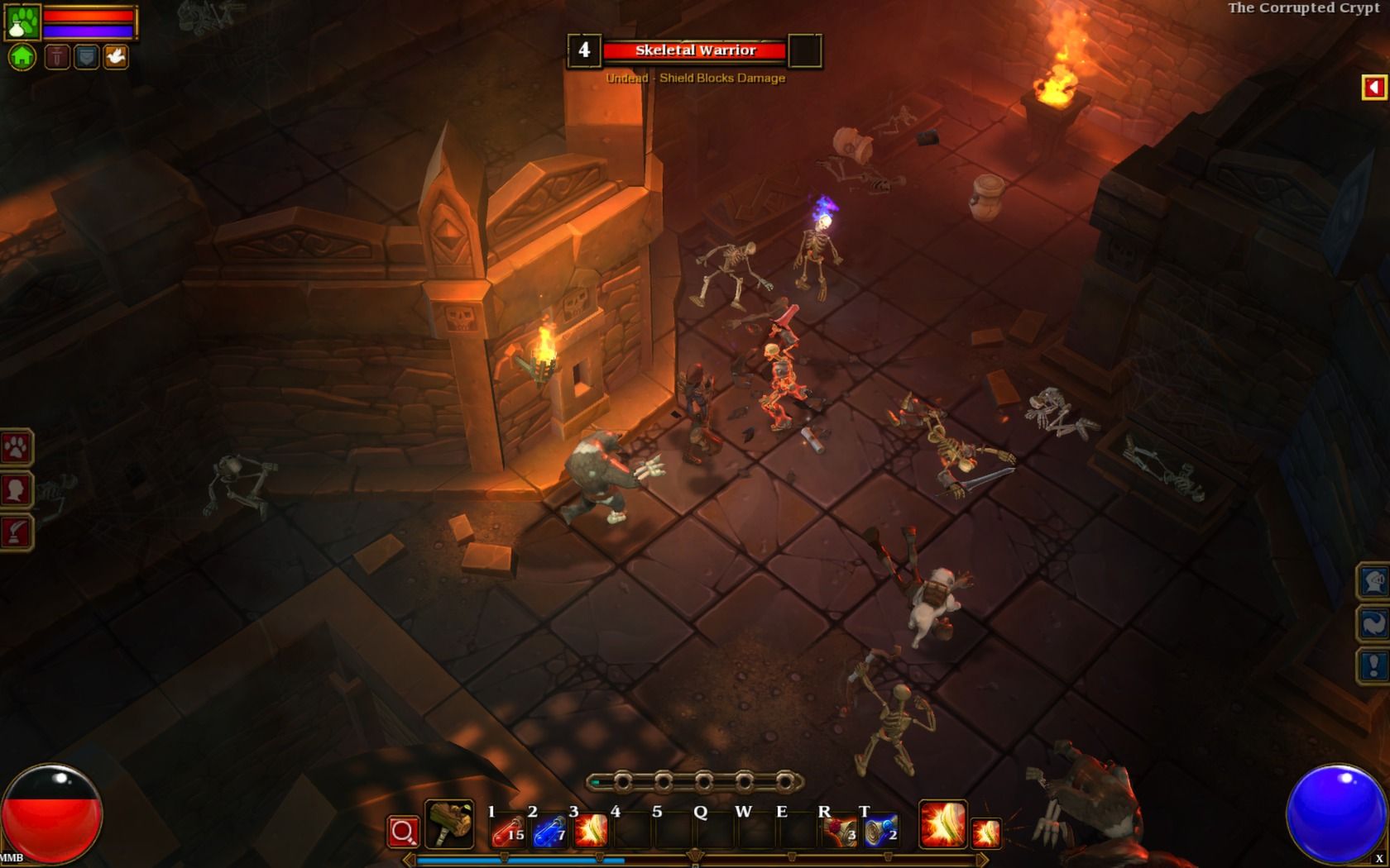 Torchlight II characters battle monsters inside a dark crypt.