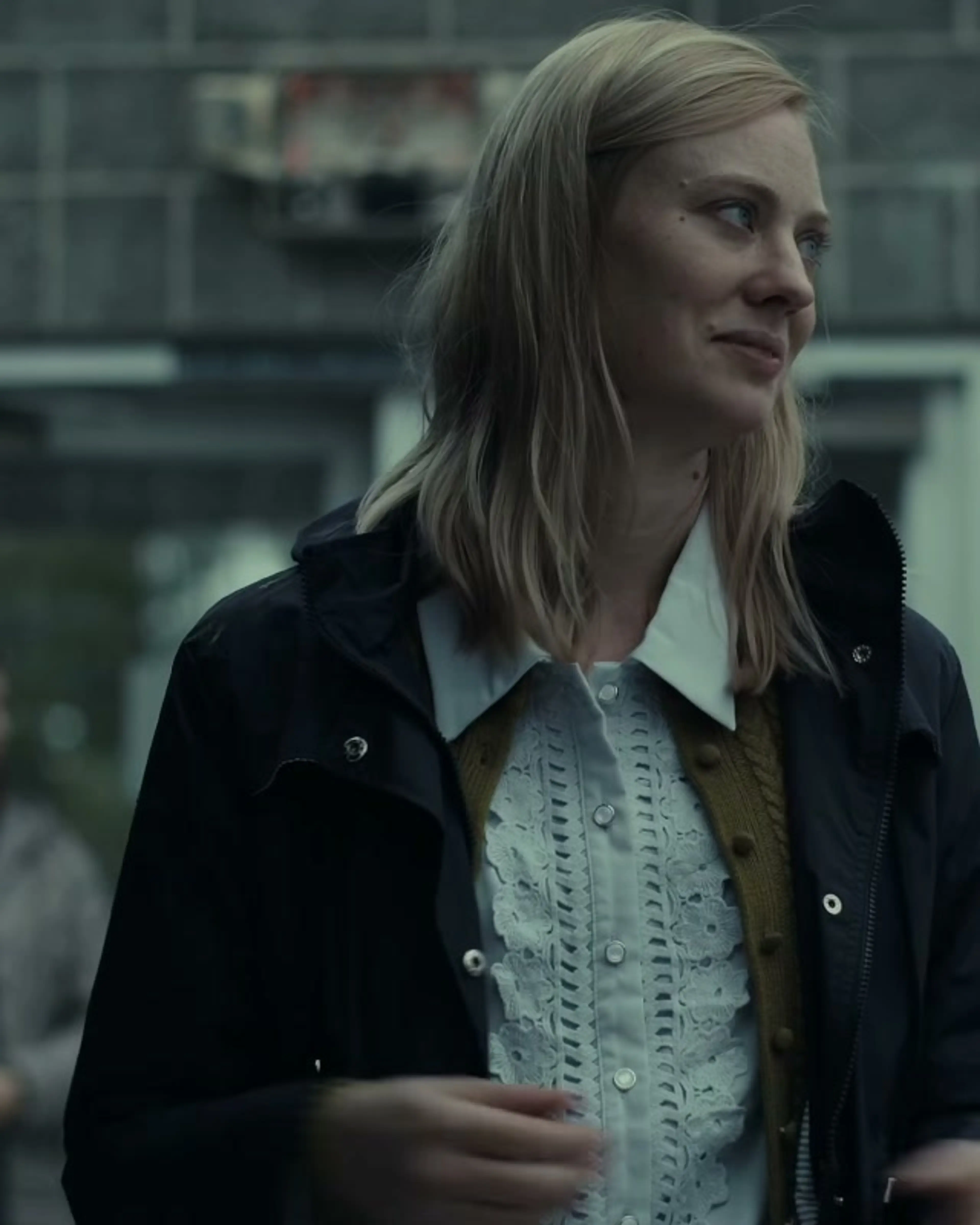 Deborah Ann Woll stands by an FBI investigator in an official The Cycle trailer frame.