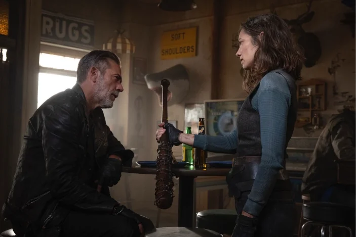 Maggie and Negan move through an interior location in an official Dead City Season 3 still.