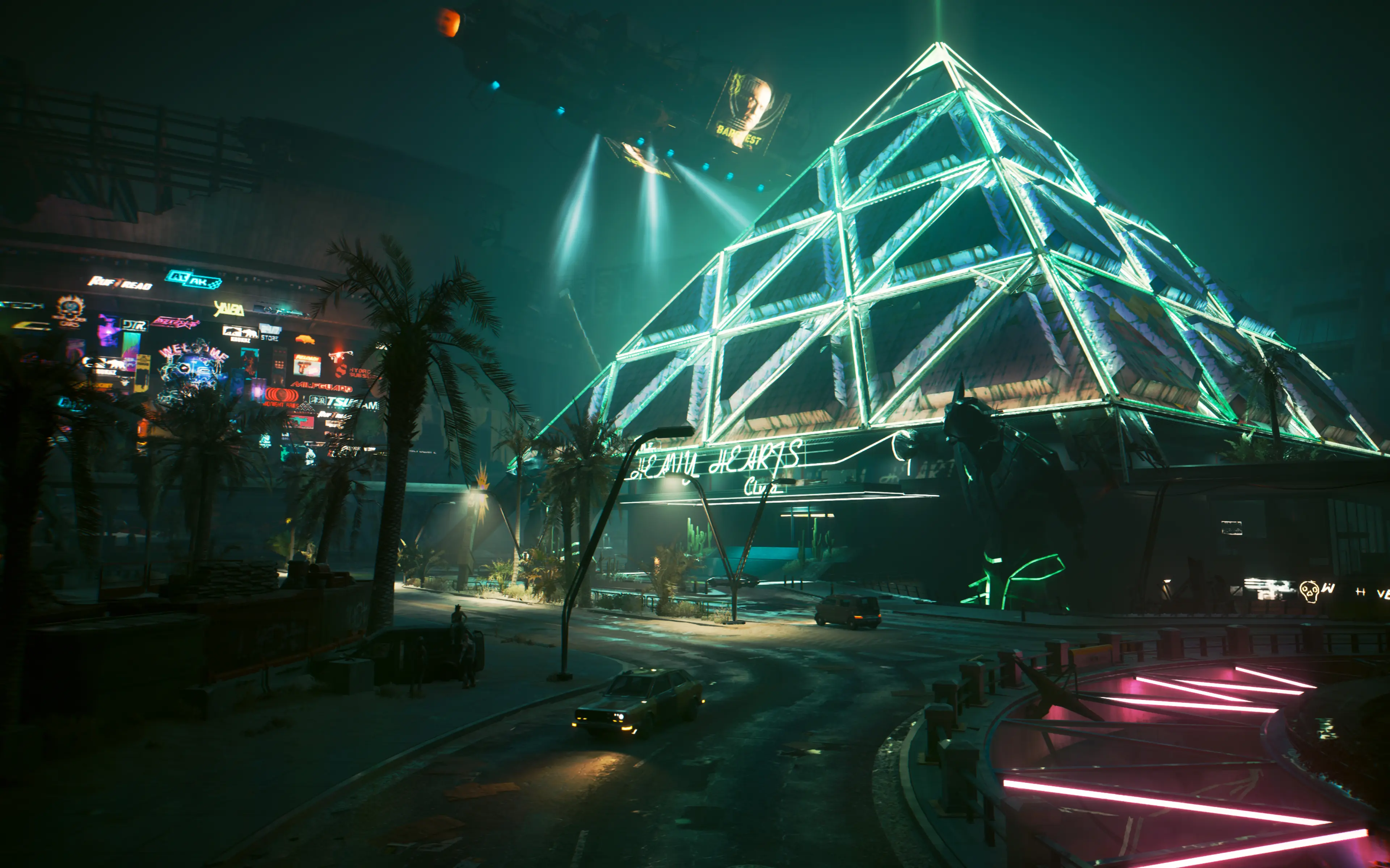 The Black Sapphire pyramid glows above a Night City street in Cyberpunk 2077.