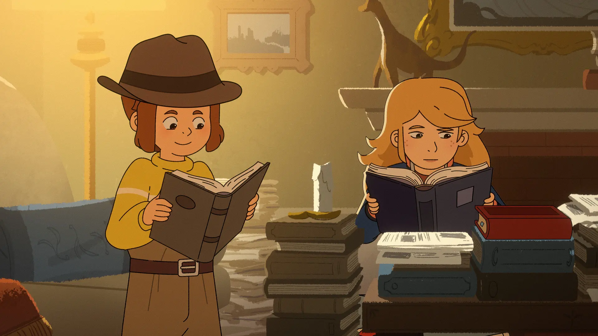 Daphne and Sabrina Grimm read books in an official season two still.