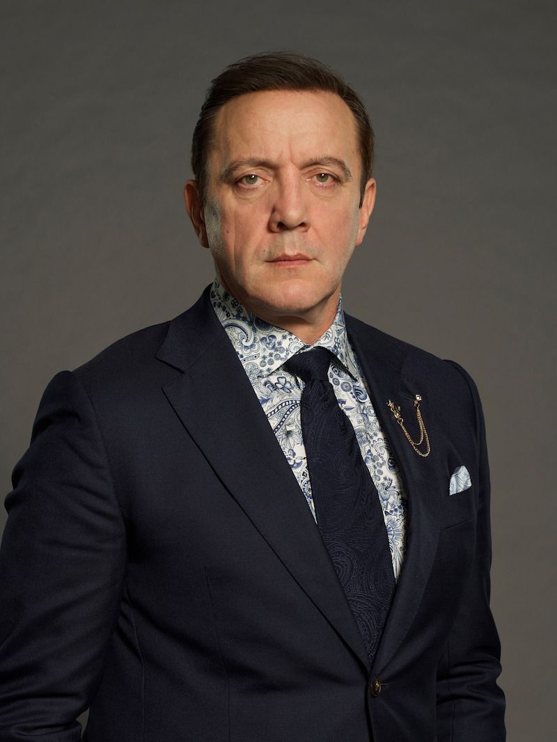 Peter Serafinowicz poses in a dark suit for Celebrity Million Dollar Secret.