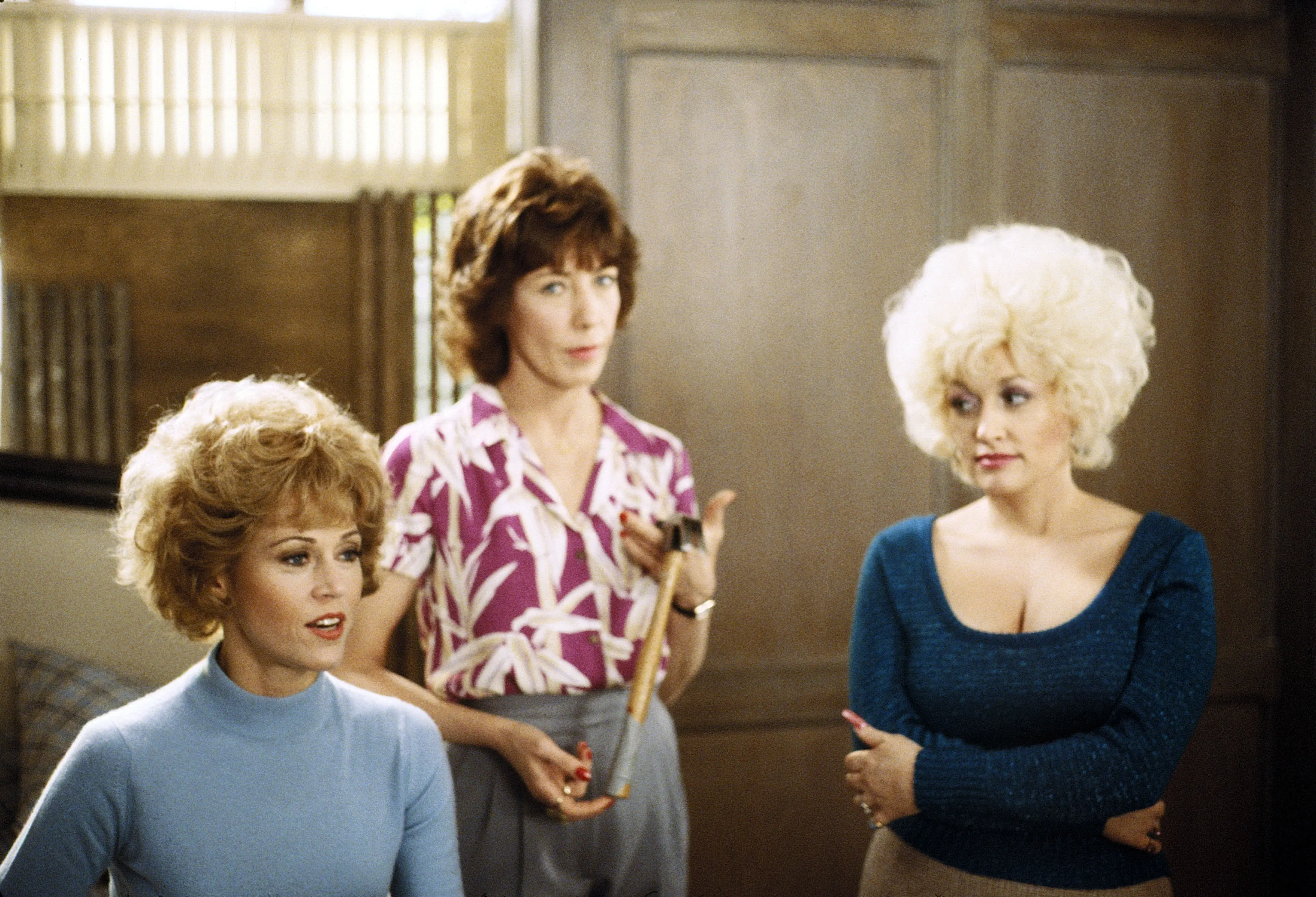 Jane Fonda, Lily Tomlin and Dolly Parton together in an office scene from 9 to 5.
