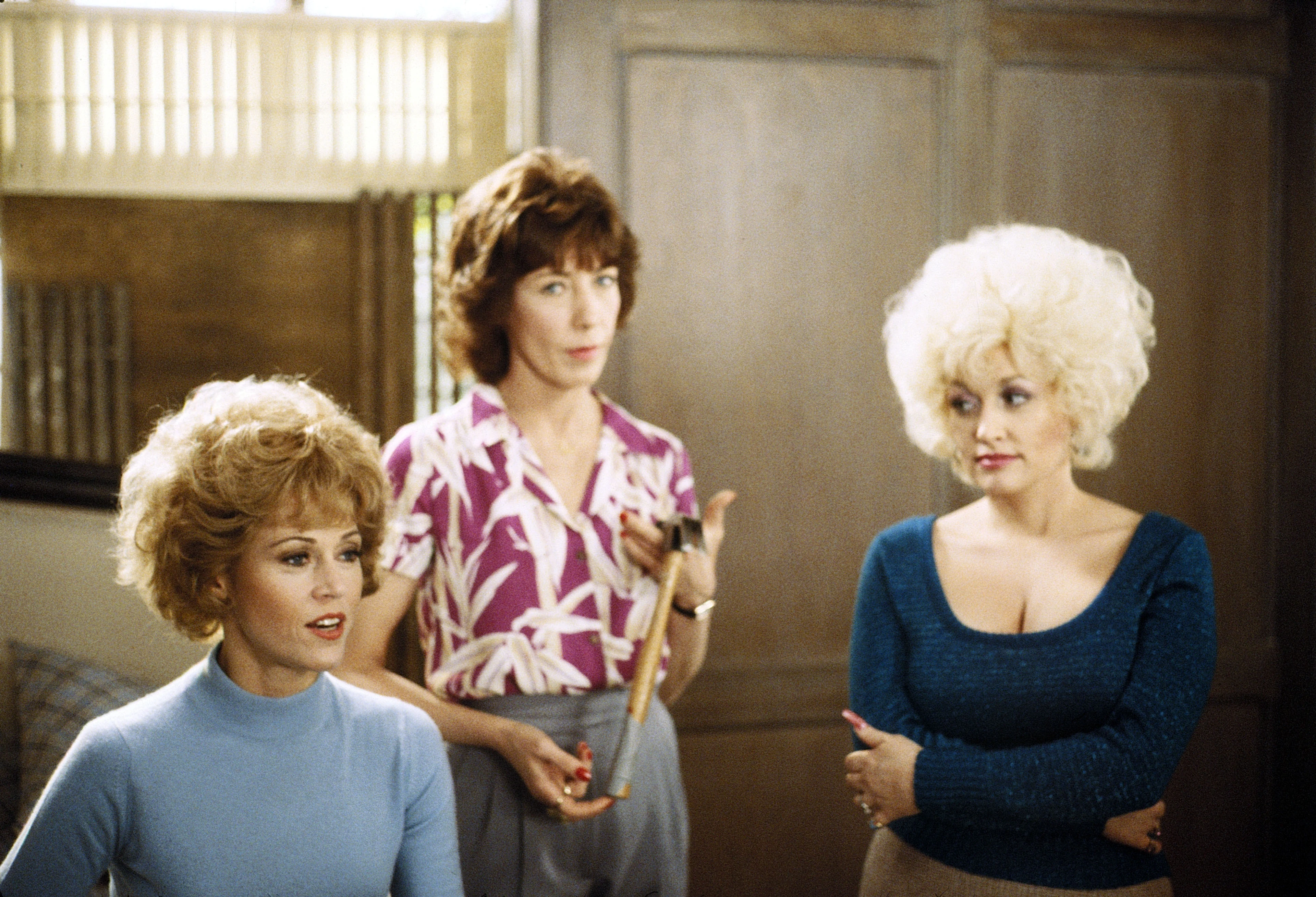 Jane Fonda, Lily Tomlin and Dolly Parton together in an office scene from 9 to 5.