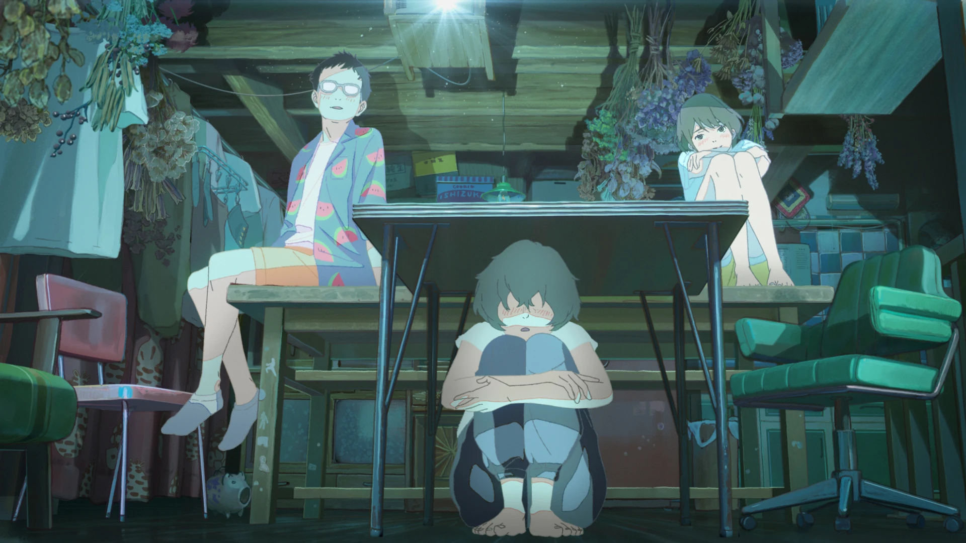 Three young people gather inside a crowded wooden workshop.