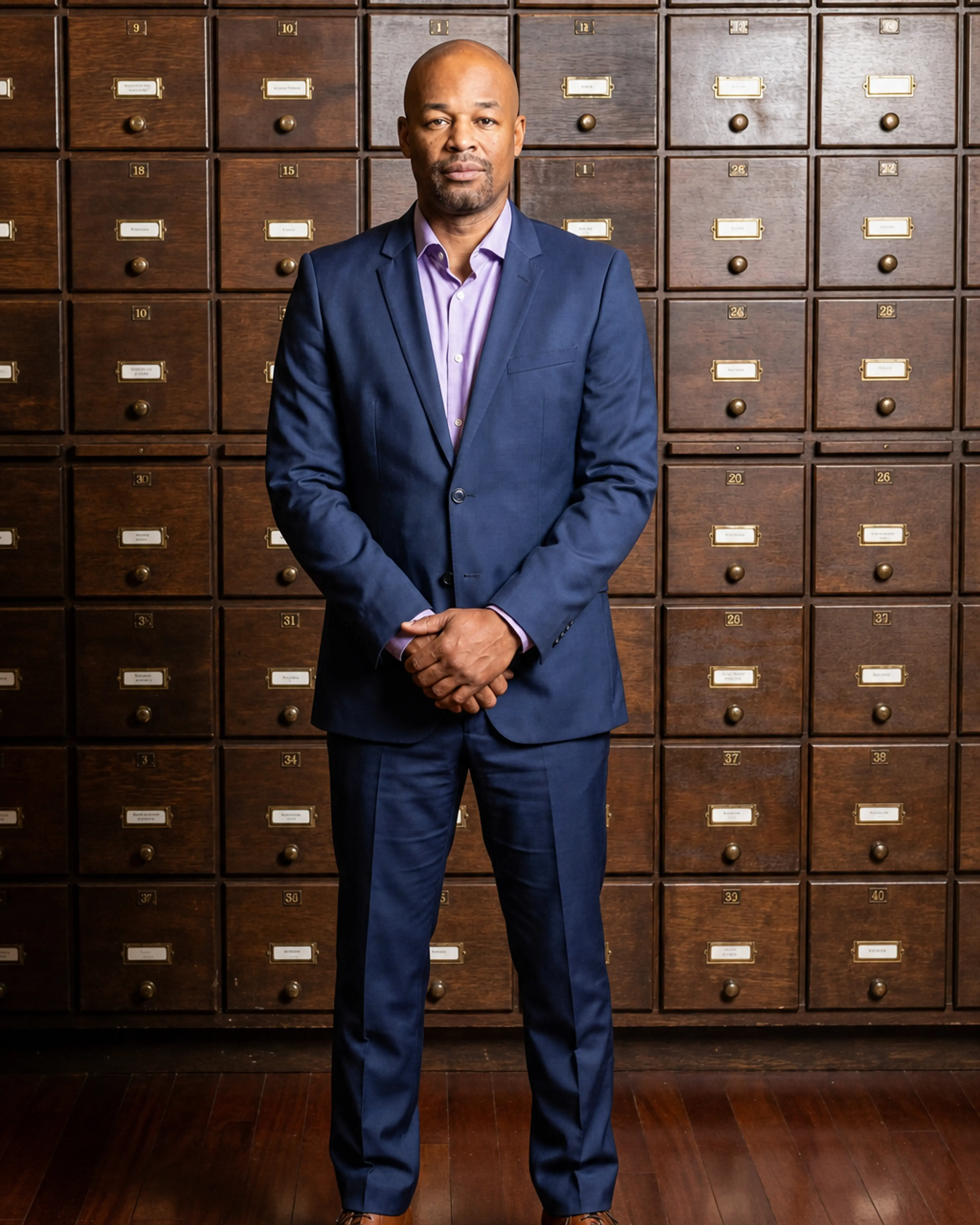 Champ, a Chicago Ready to Love contestant, wears a blue suit in his official cast portrait.