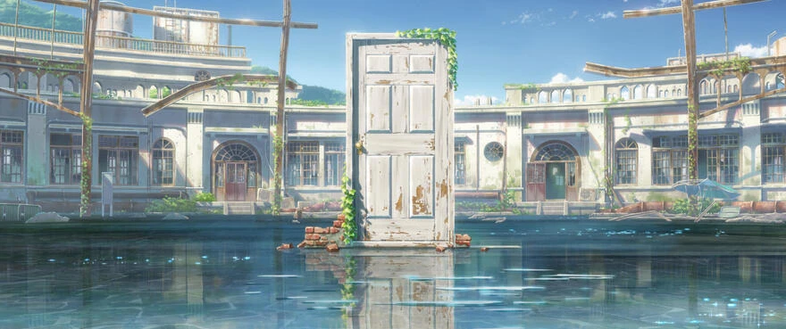 A white door stands in shallow water among the overgrown buildings of an abandoned resort.