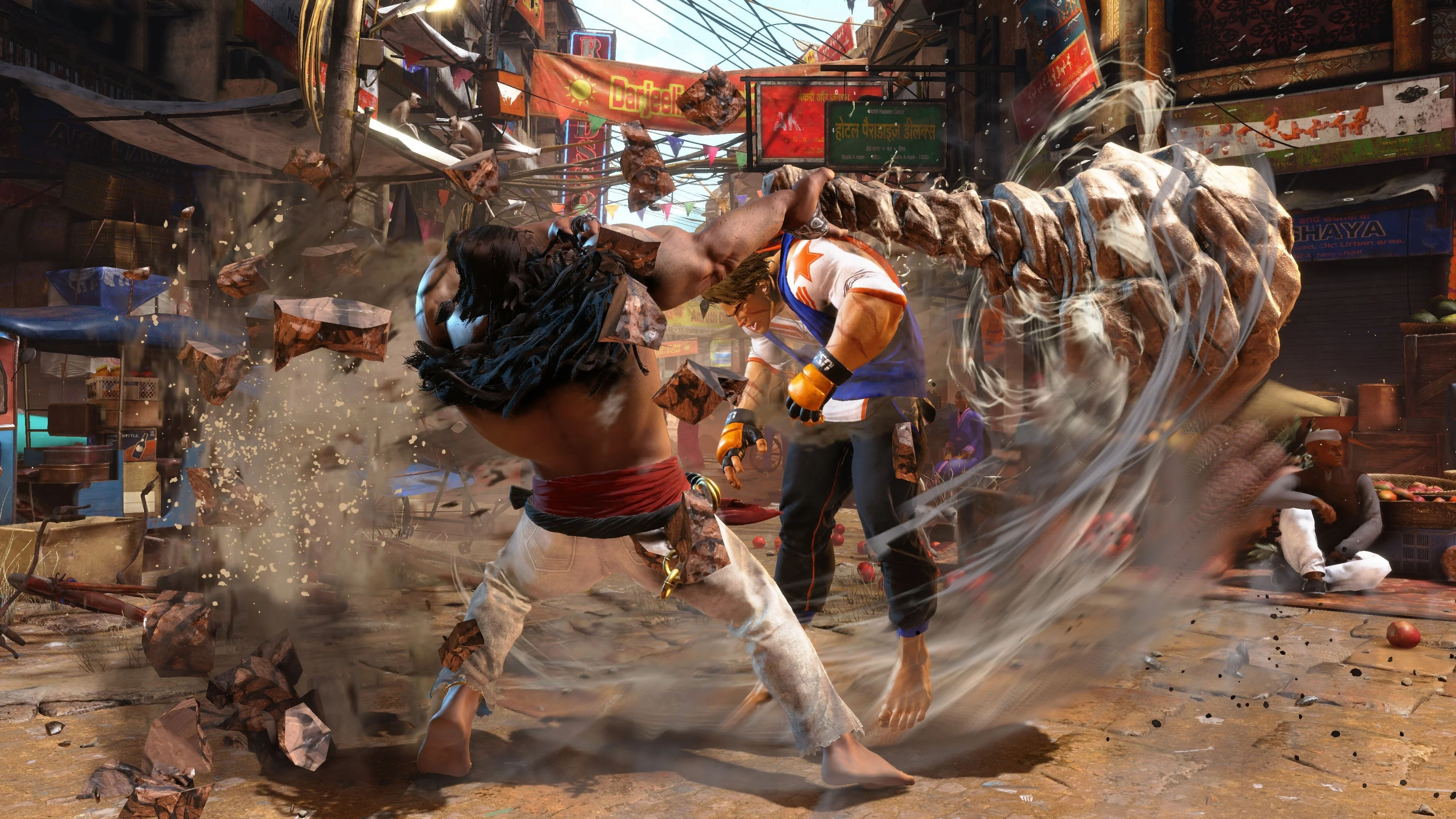 Arjun swings a large stone pillar into Luke during a Street Fighter 6 match.