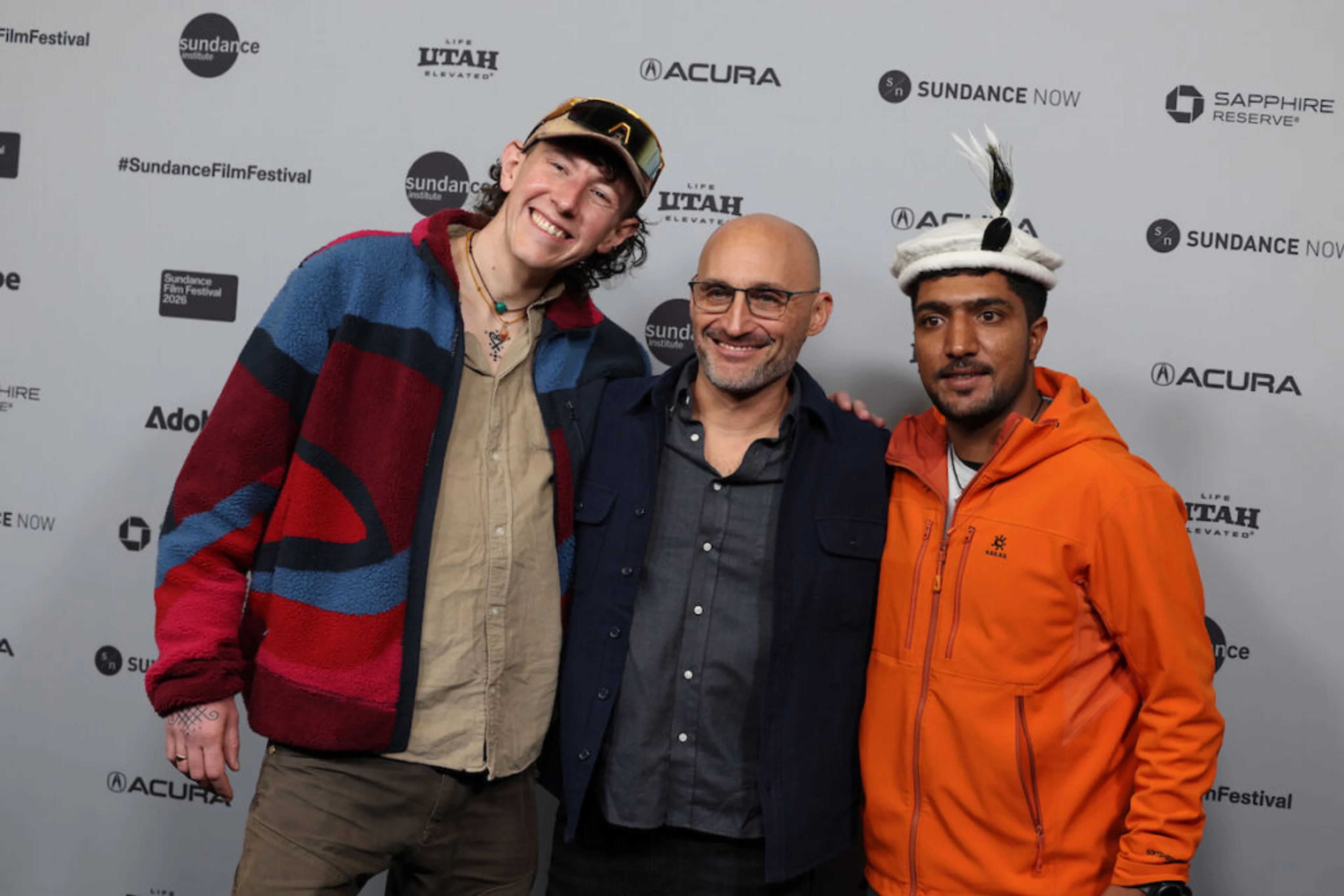 Sandro Gromen-Hayes, Amir Bar-Lev and Sajid Sadpara stand together at the film’s Sundance premiere.