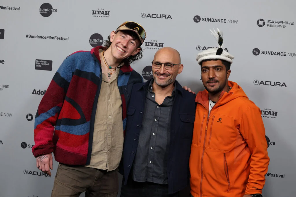Sandro Gromen-Hayes, Amir Bar-Lev and Sajid Sadpara stand together at the film’s Sundance premiere.