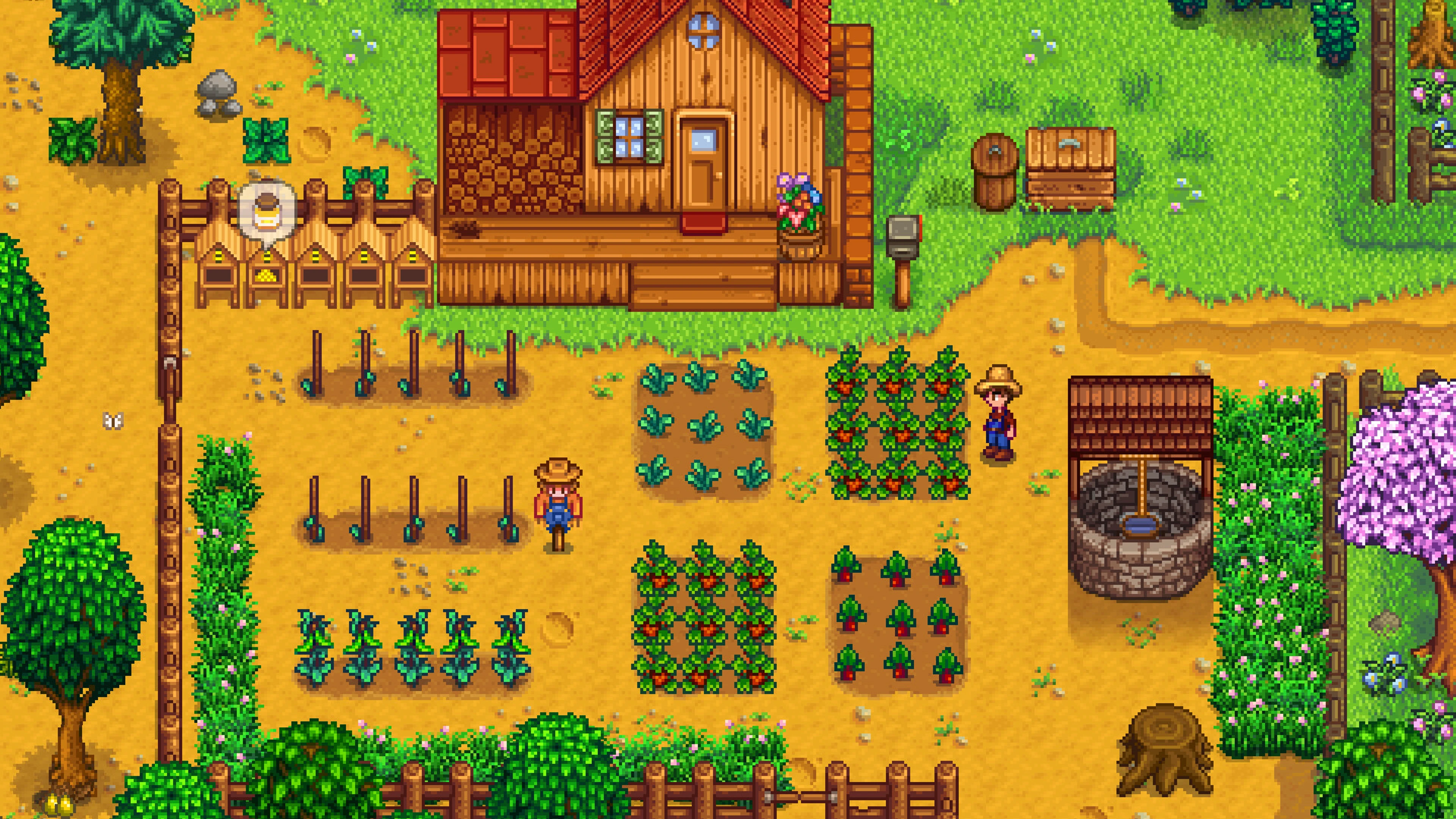 Spring crops beside a farmhouse in Stardew Valley.