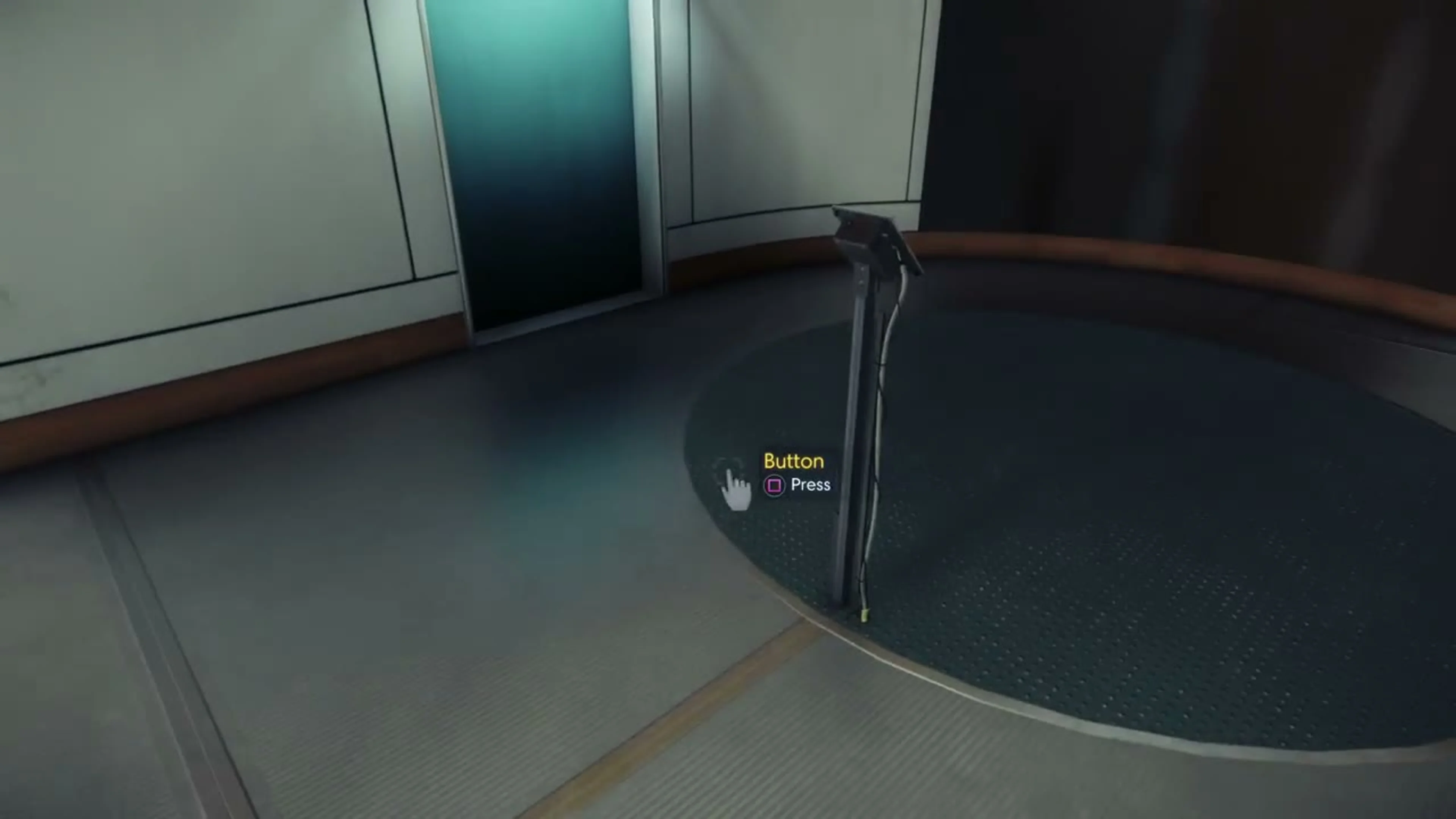 A slim test-room button post with a yellow Button label and PlayStation Square Press prompt.