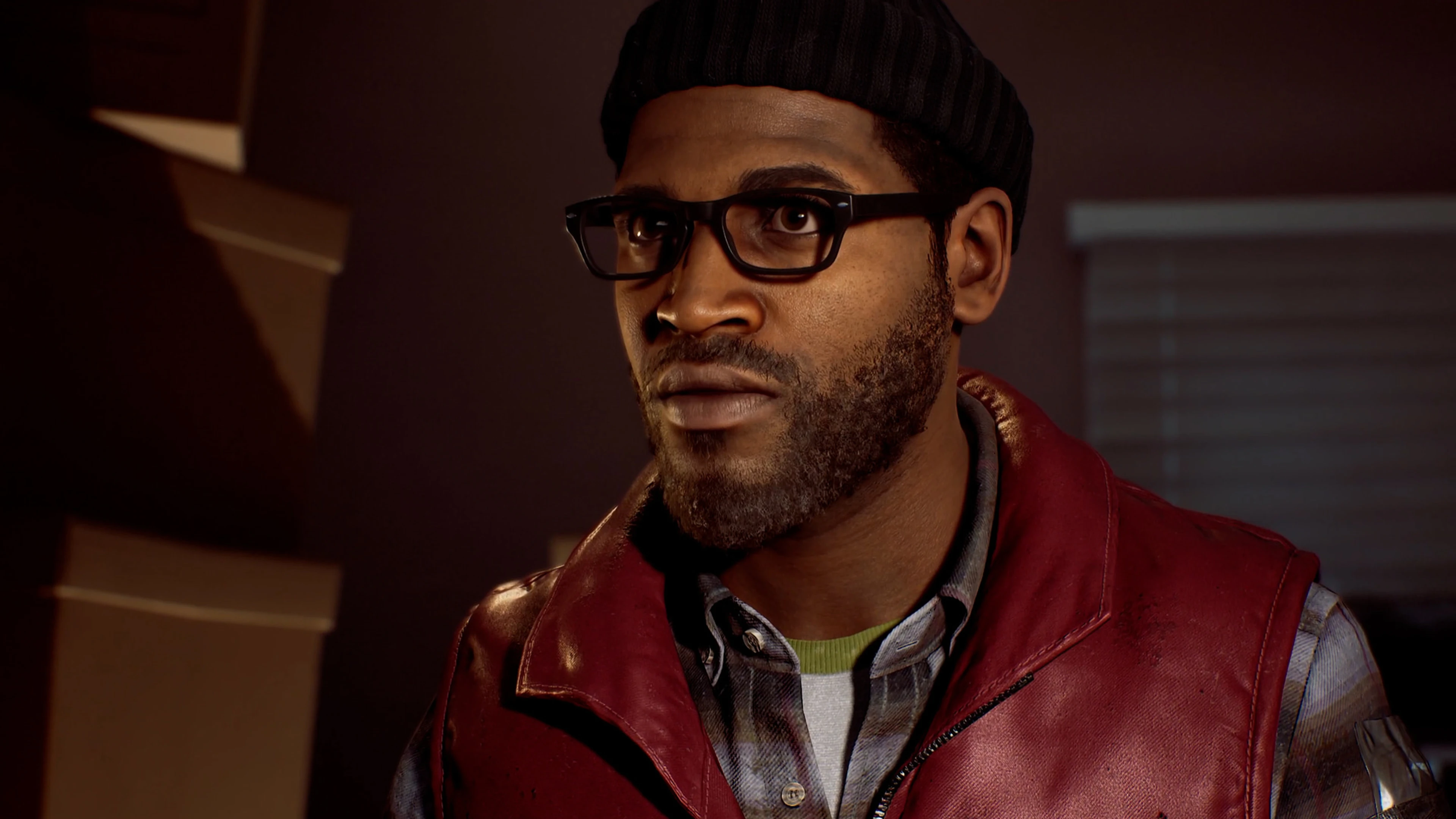 A Silent Hill: Townfall character in a red vest looks upward inside a dimly lit room.