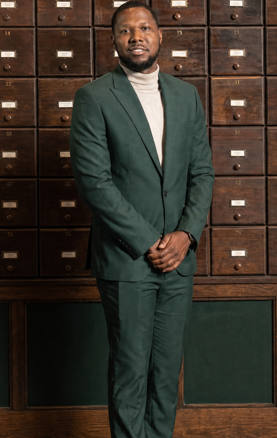 Jonathan, a Chicago Ready to Love contestant, wears a dark green suit in his official cast portrait.