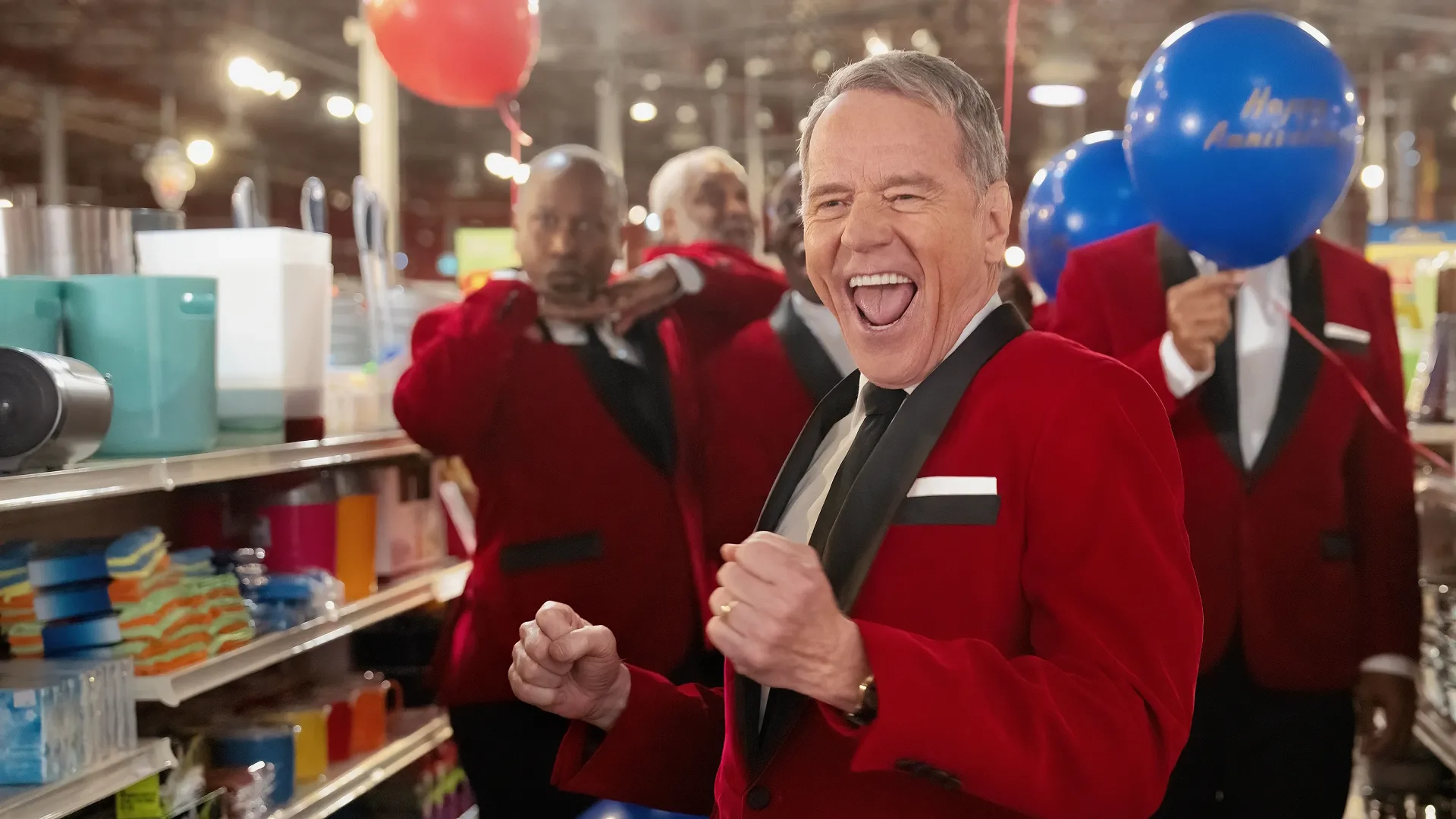 Bryan Cranston as Hal, smiling in a red tuxedo in Malcolm in the Middle: Life’s Still Unfair.