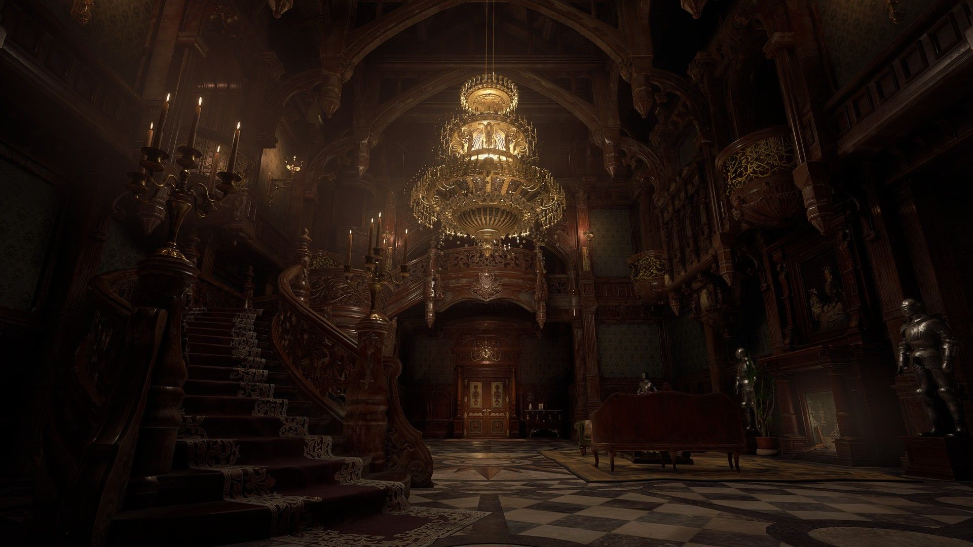 A tall chandelier lights the entrance hall of Castle Dimitrescu.