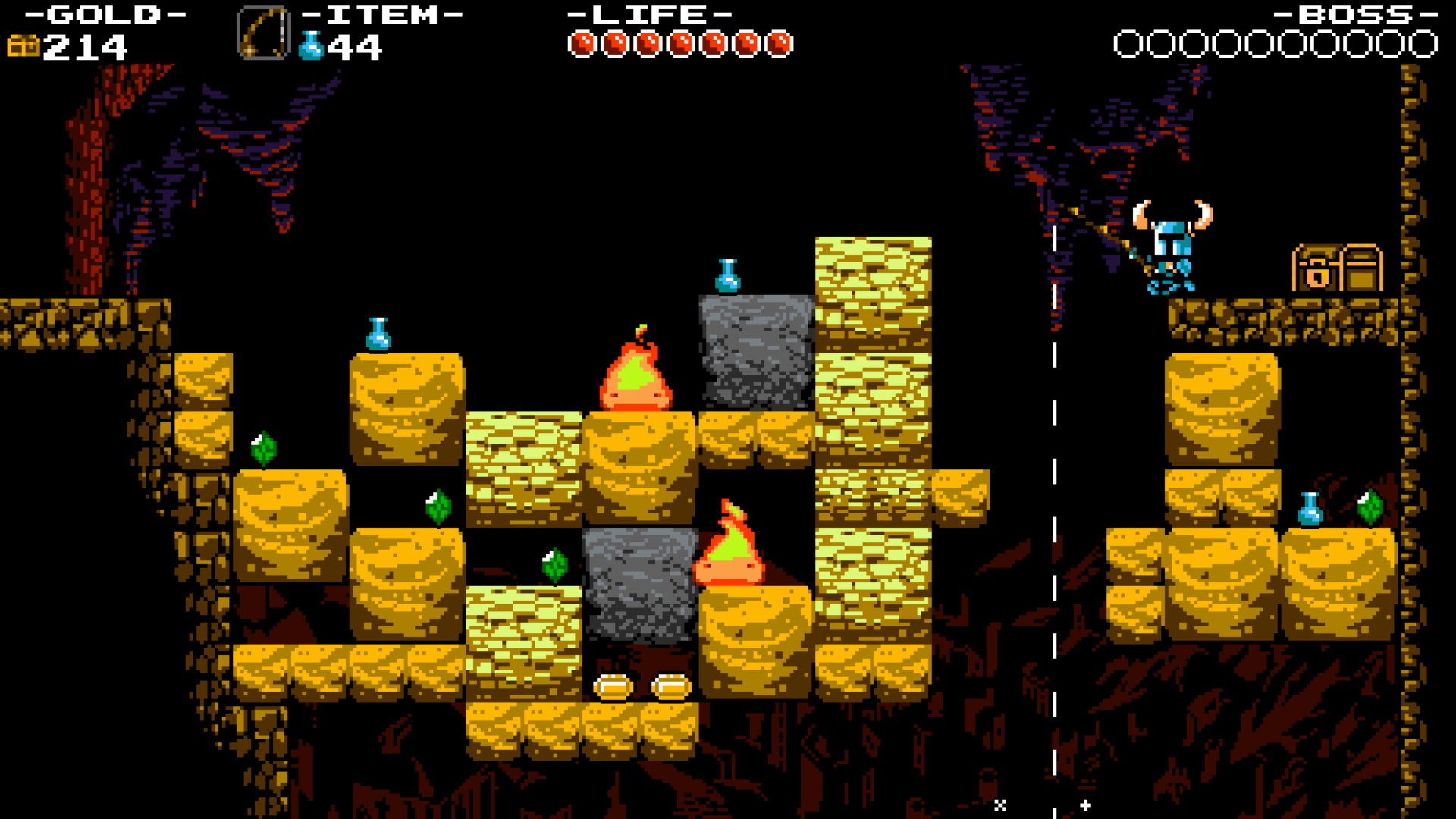 Shovel Knight faces diggable golden blocks, gems, small fire enemies and a chest across a gap.