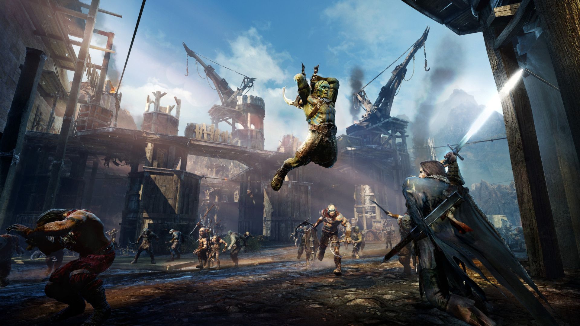 Talion fights Orcs in a walled stronghold as one attacker leaps through the air.