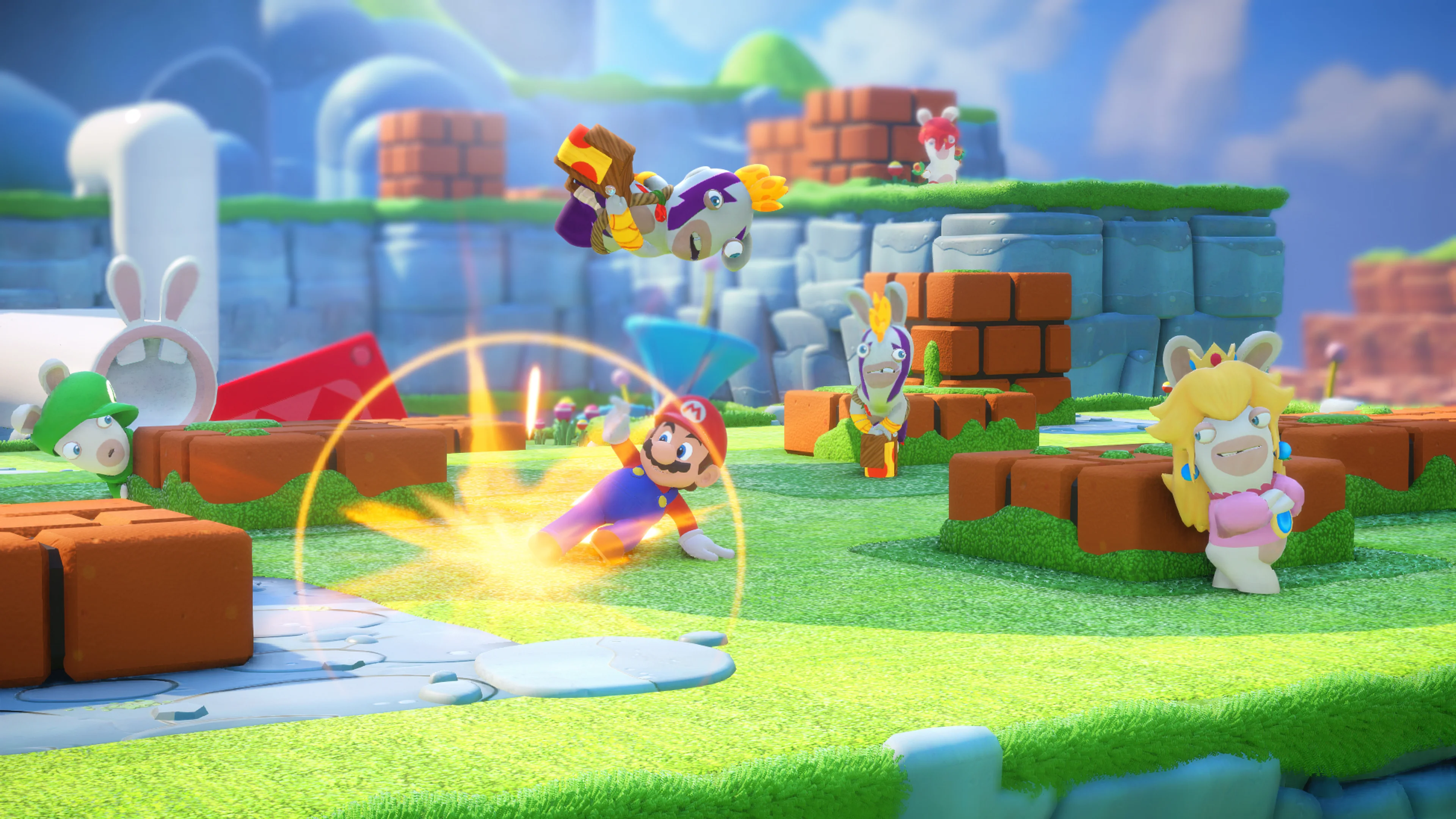 Mario and the Rabbids fight enemies on a colorful battlefield in Mario + Rabbids Kingdom Battle.
