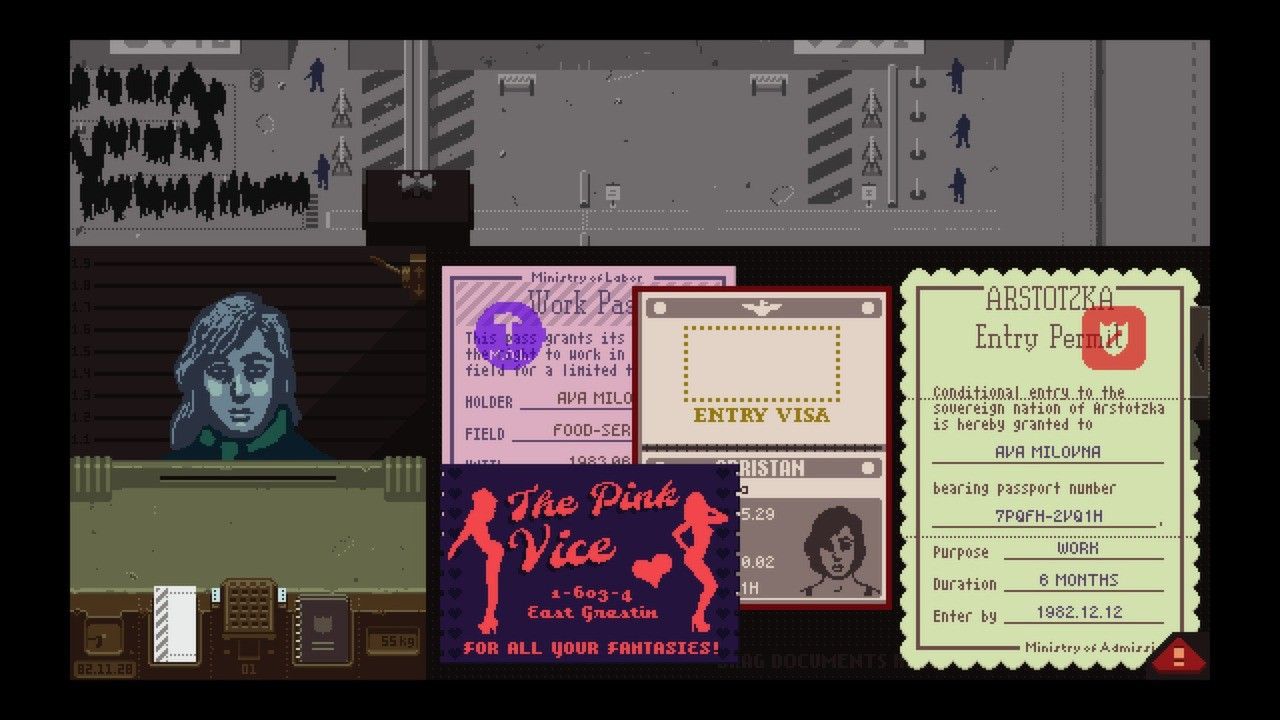 Several identity documents overlap on the inspector’s desk beside a traveler.