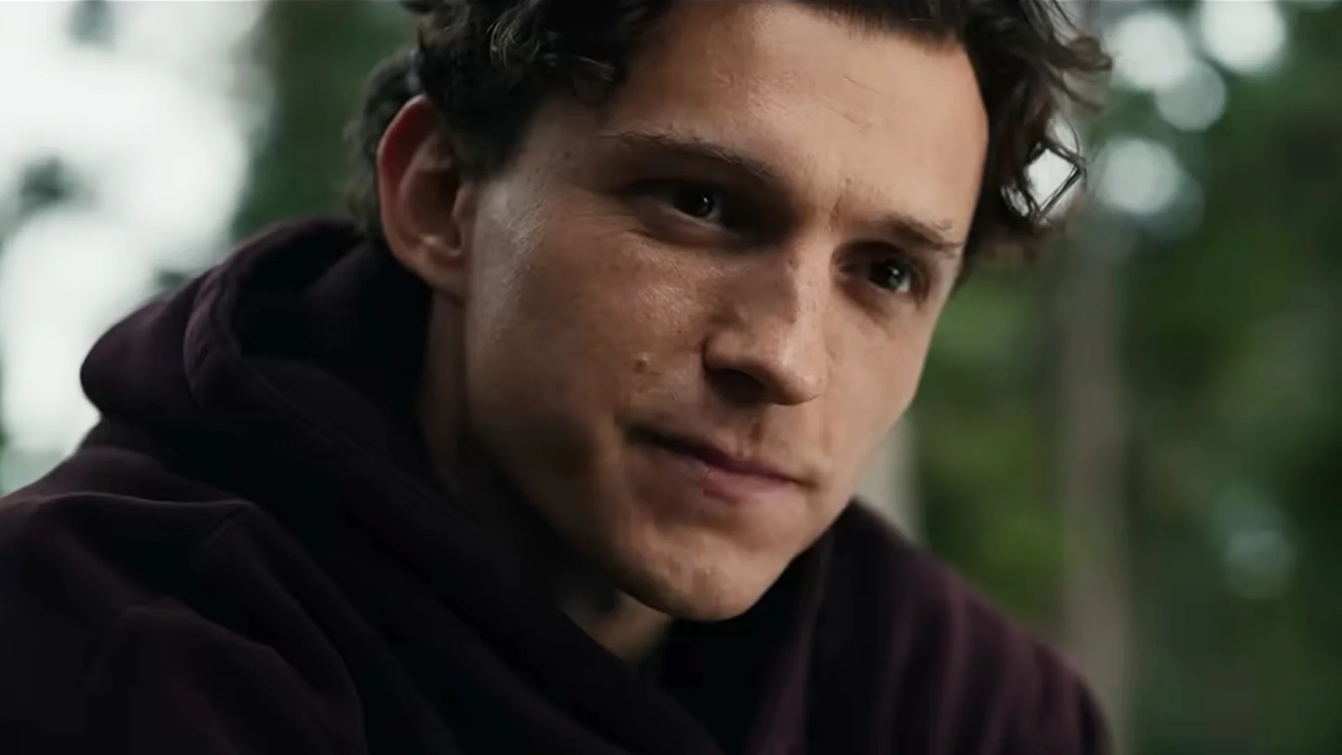 Tom Holland as Peter Parker looks ahead in Spider-Man: Brand New Day.