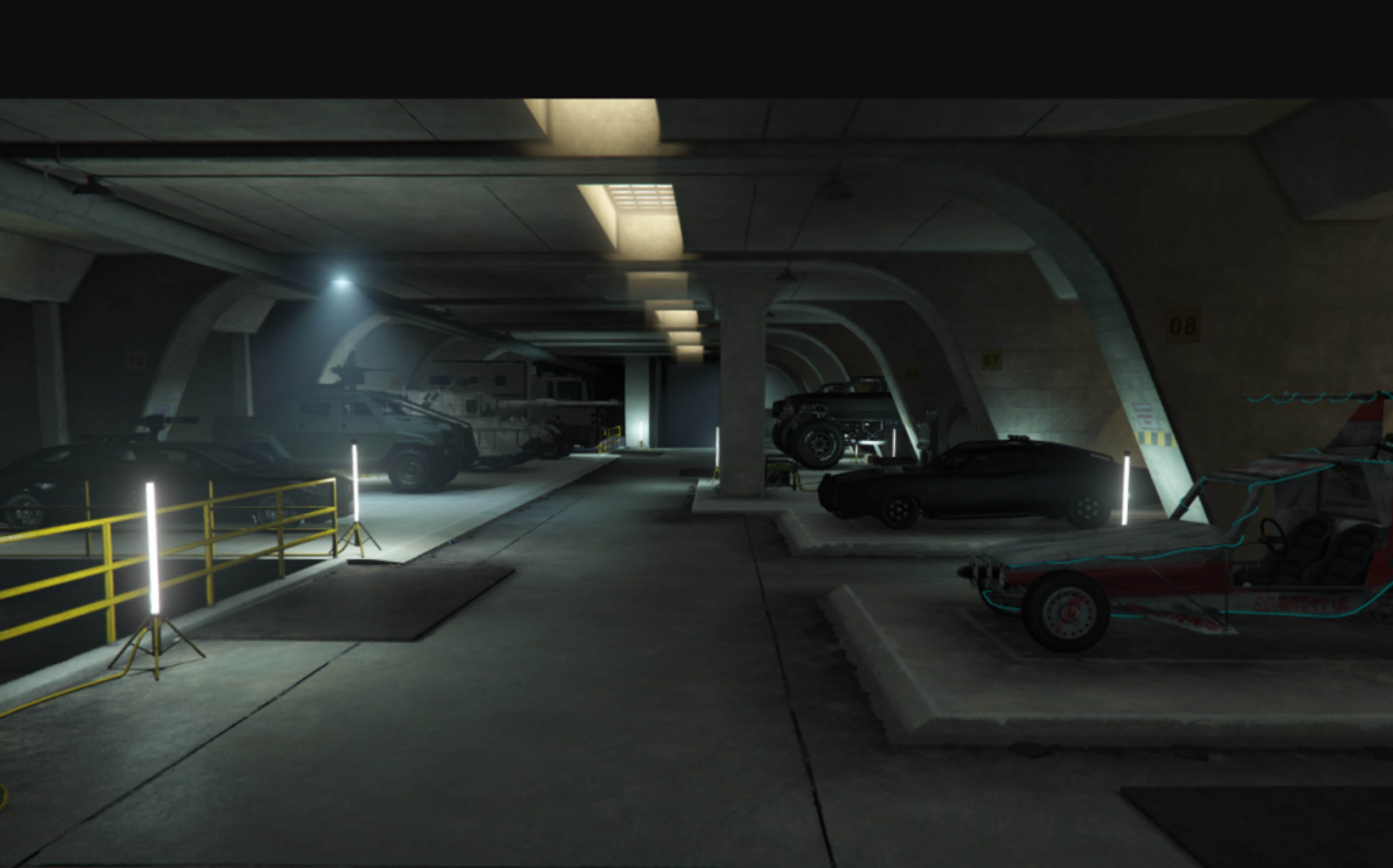 Vehicles and equipment stored inside a GTA Online Bunker.