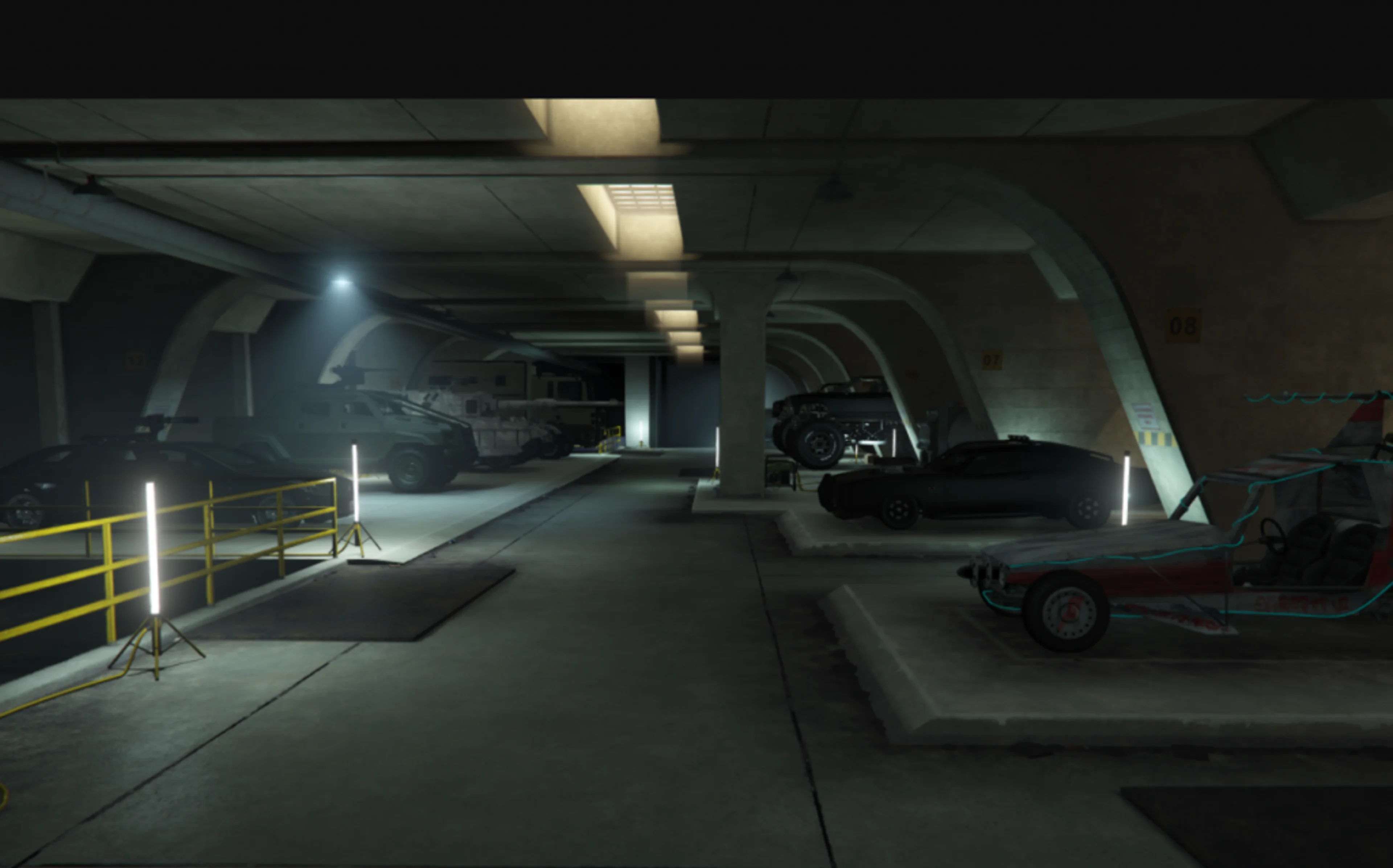 Vehicles and equipment stored inside a GTA Online Bunker.