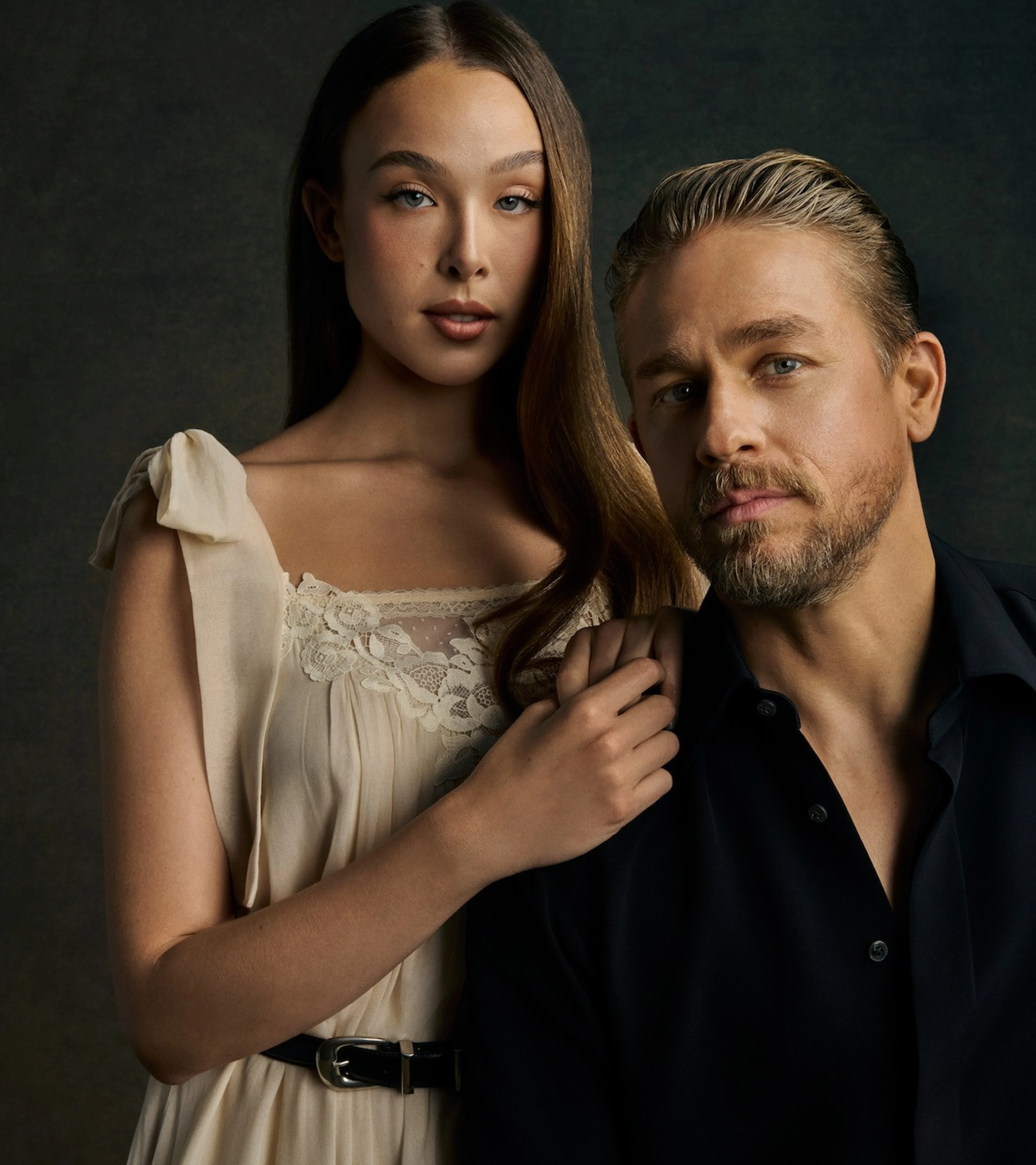 Ella Beatty and Charlie Hunnam pose for Monster: The Lizzie Borden Story.