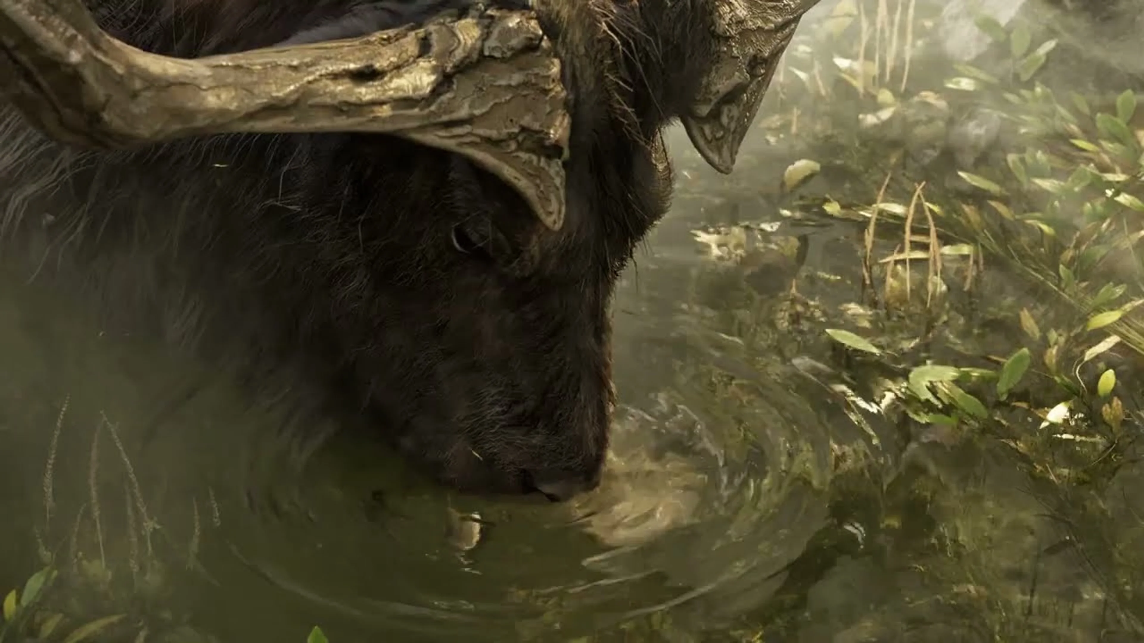 A massive horned creature lowers its head into shallow water in a bright forest scene from the Nodusfall reveal trailer.