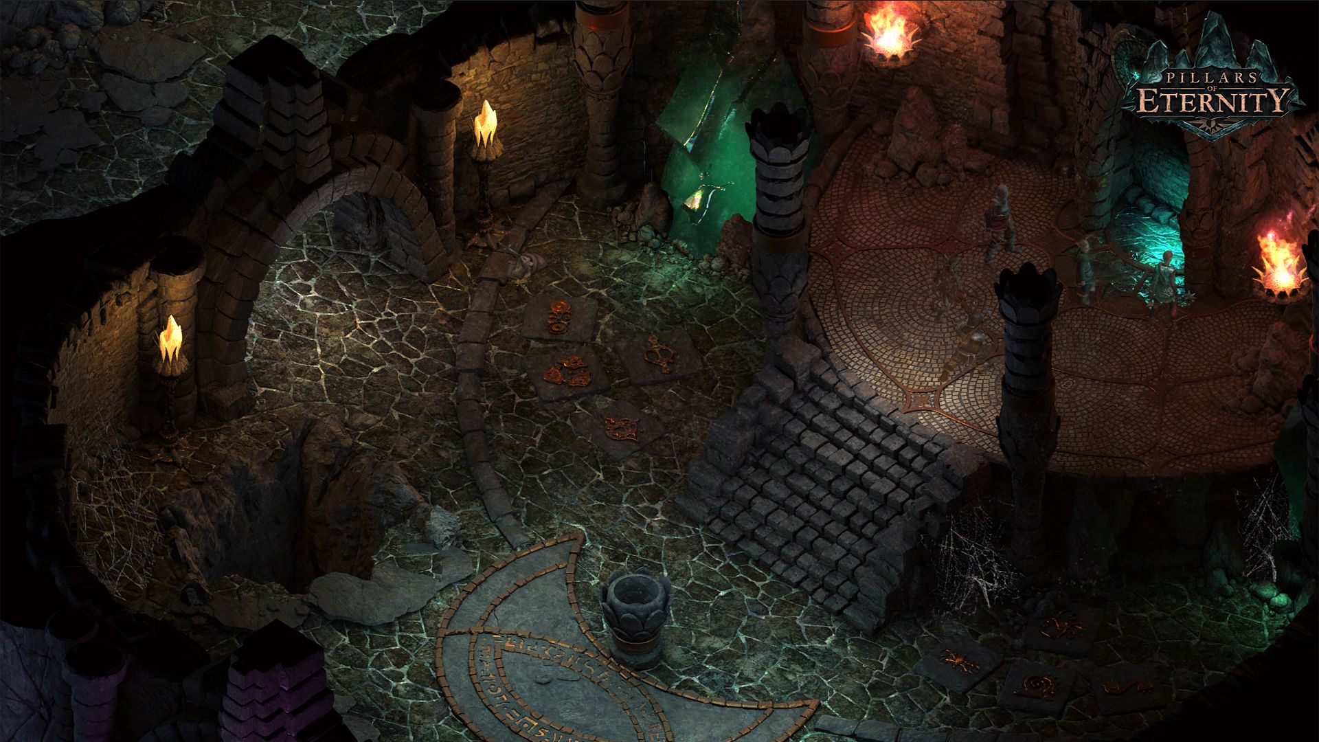 A party explores a torchlit stone chamber with stairs and a circular floor.