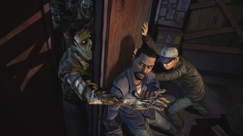 Lee and another survivor hold a door against walkers pressing from behind it.