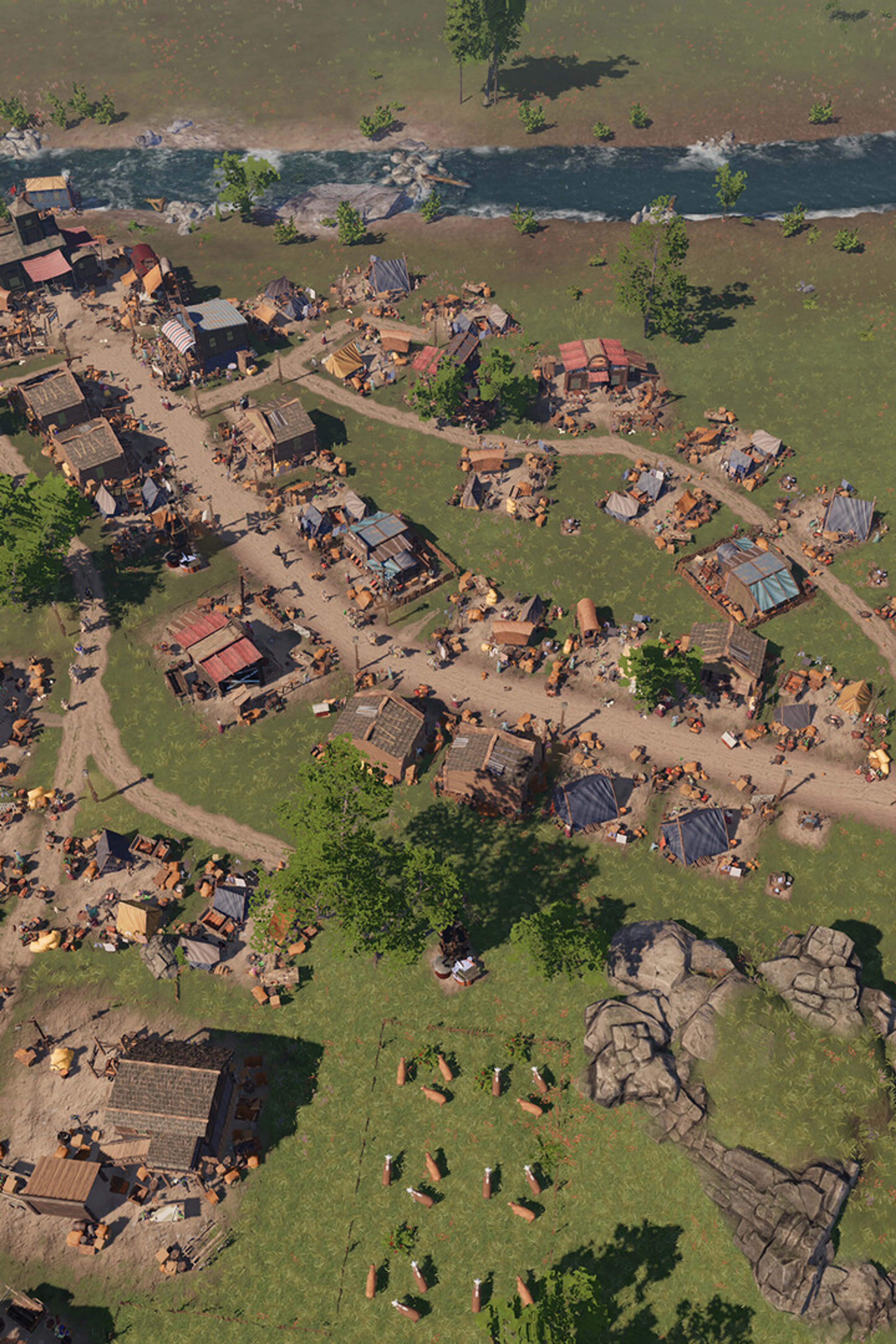 A growing riverside settlement in Wild West Pioneers.