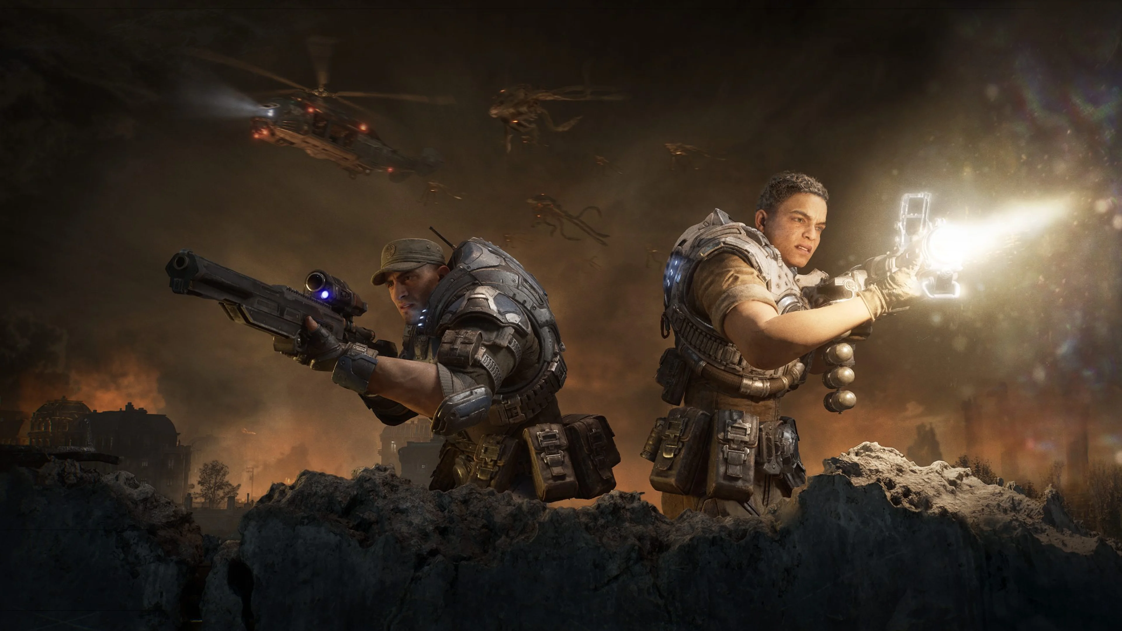 Mags and Lucas fight beside burning debris, with Lucas firing his rifle.