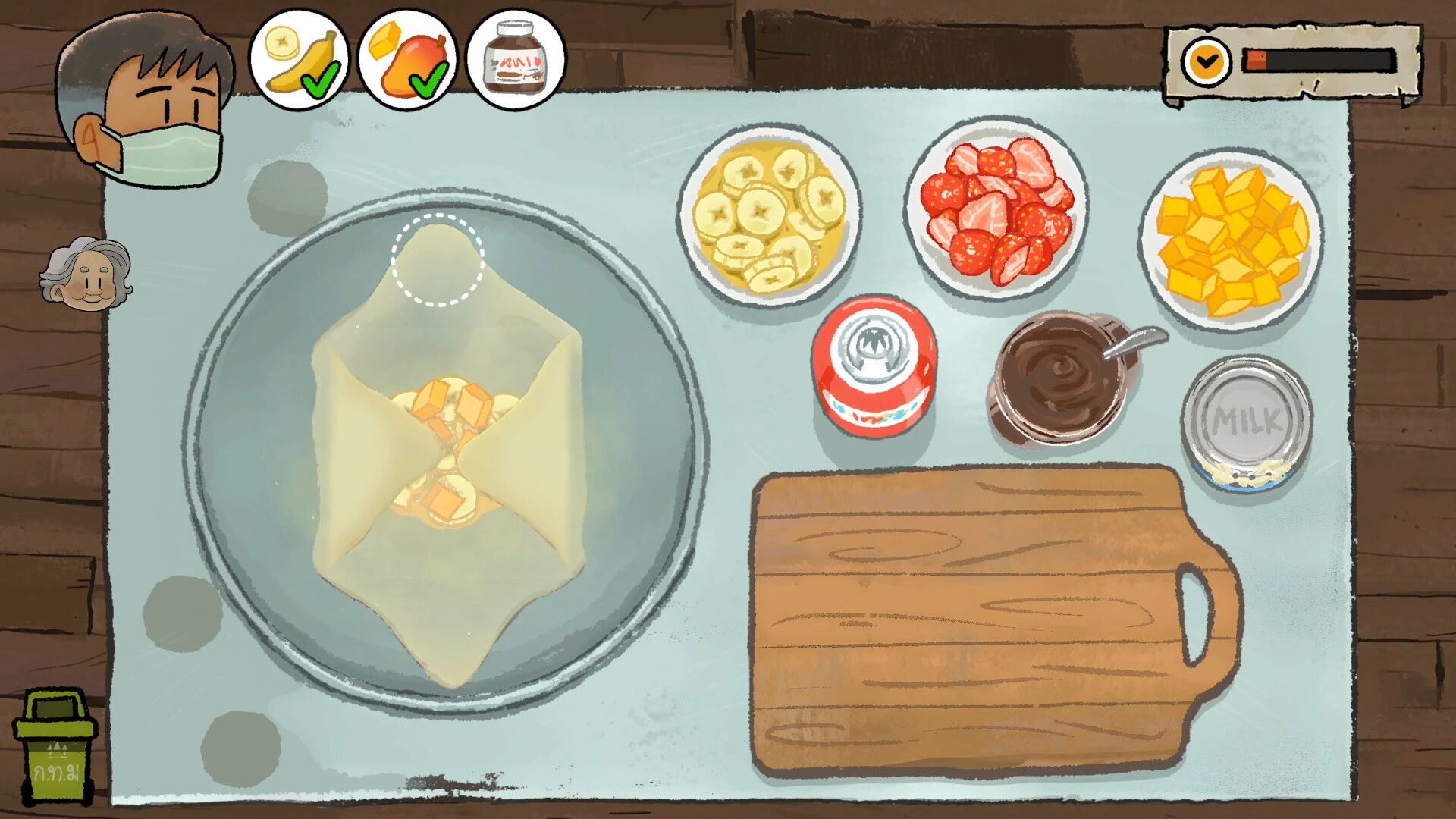A player prepares food during a cooking minigame in Dancing with Ghosts.