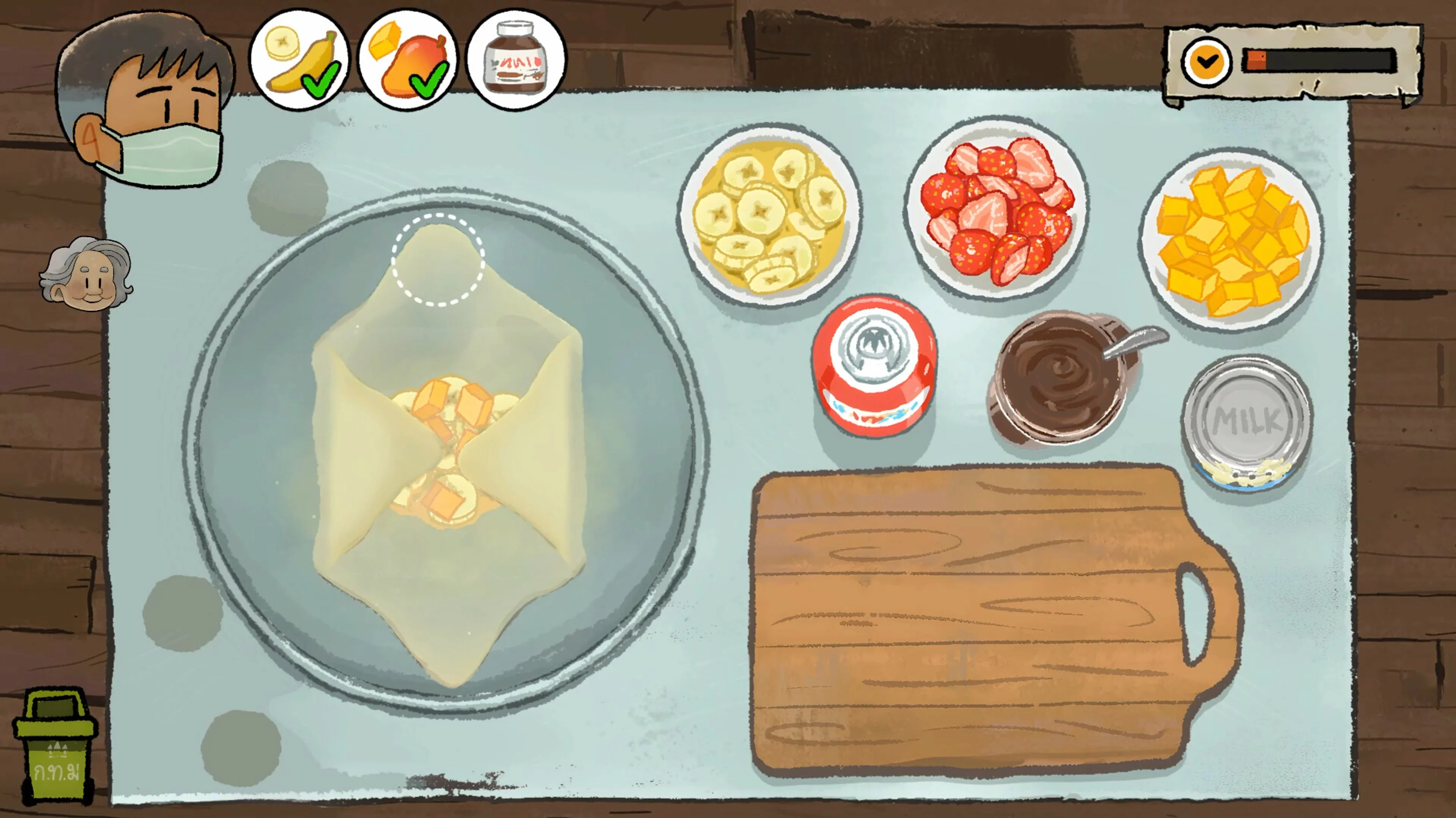 A player prepares food during a cooking minigame in Dancing with Ghosts.