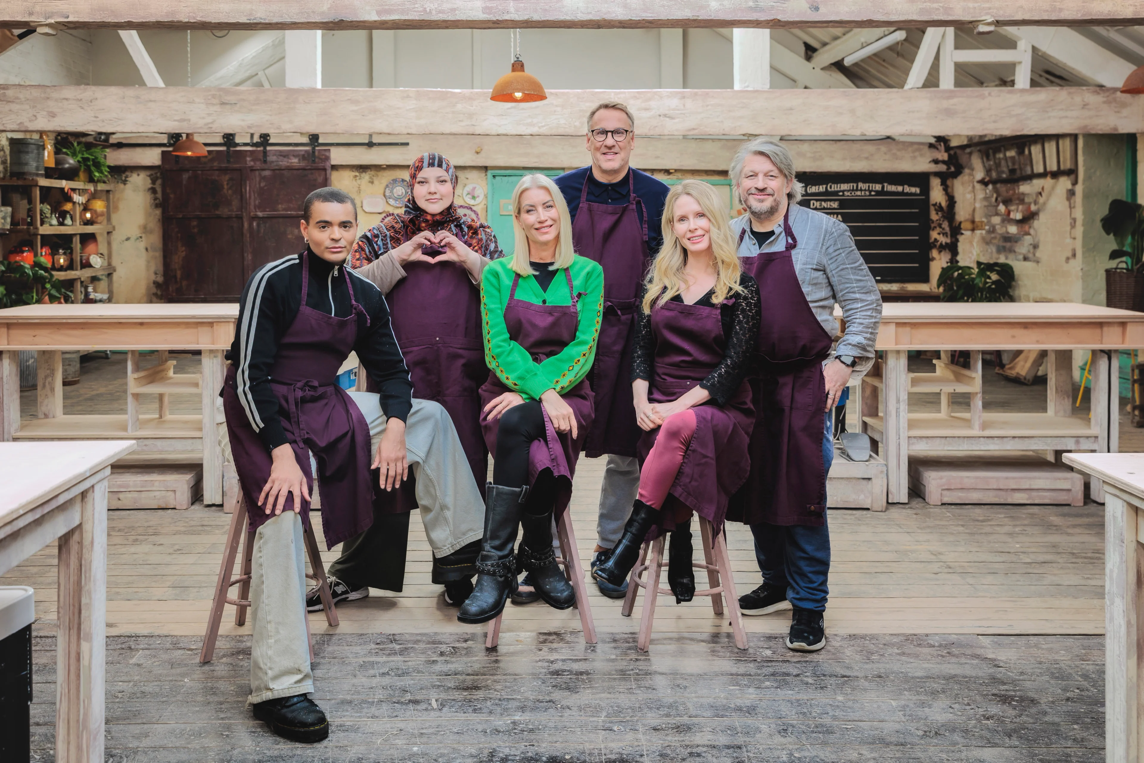 Layton Williams, Fatiha El-Ghorri, Denise Van Outen, Richard Herring, Lucy Beaumont and Paul Merson pose in the pottery.