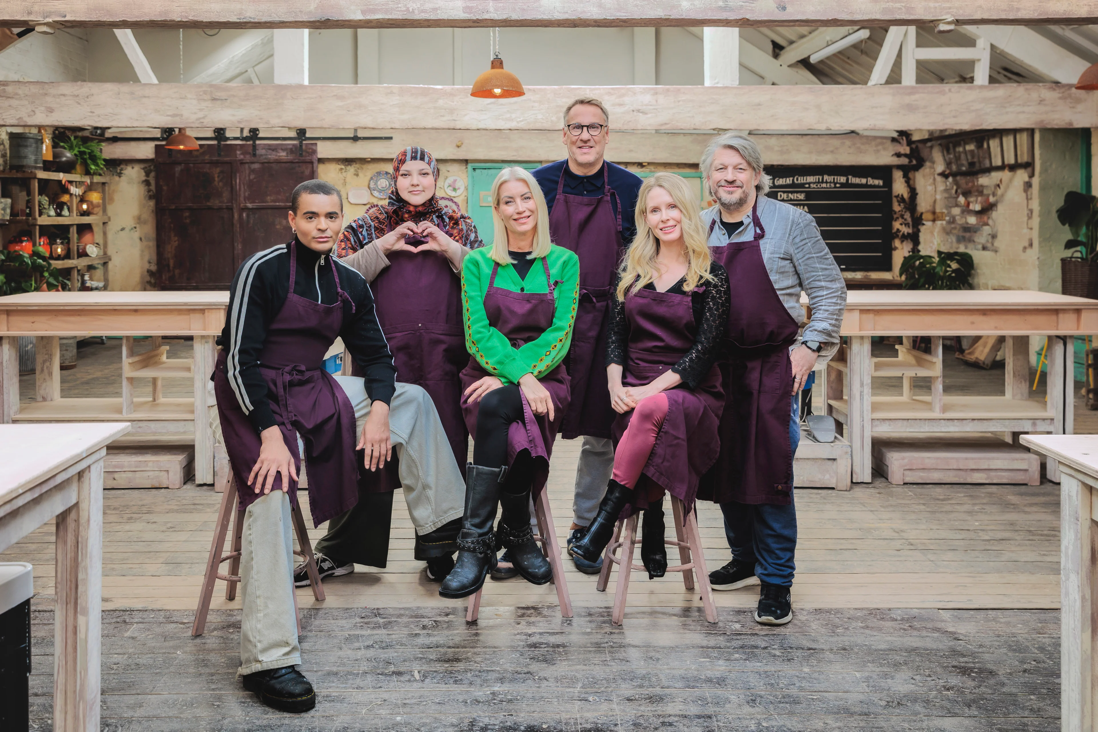 Layton Williams, Fatiha El-Ghorri, Denise Van Outen, Richard Herring, Lucy Beaumont and Paul Merson pose in the pottery.