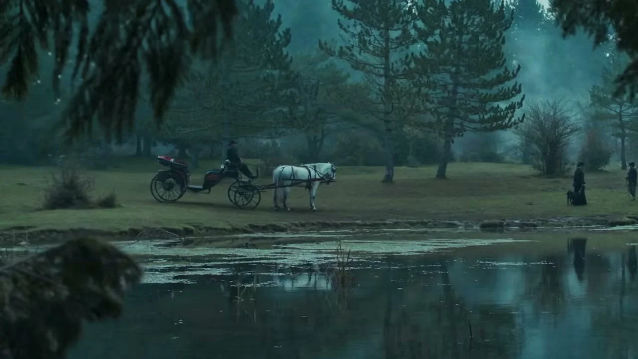 People search along a riverbank in the period setting of The Harvester.